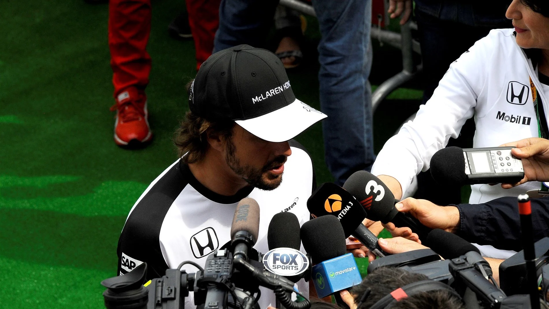 Fernando Alonso (ESP) McLaren talks to the media at Formula One World Championship, Rd11, Belgian