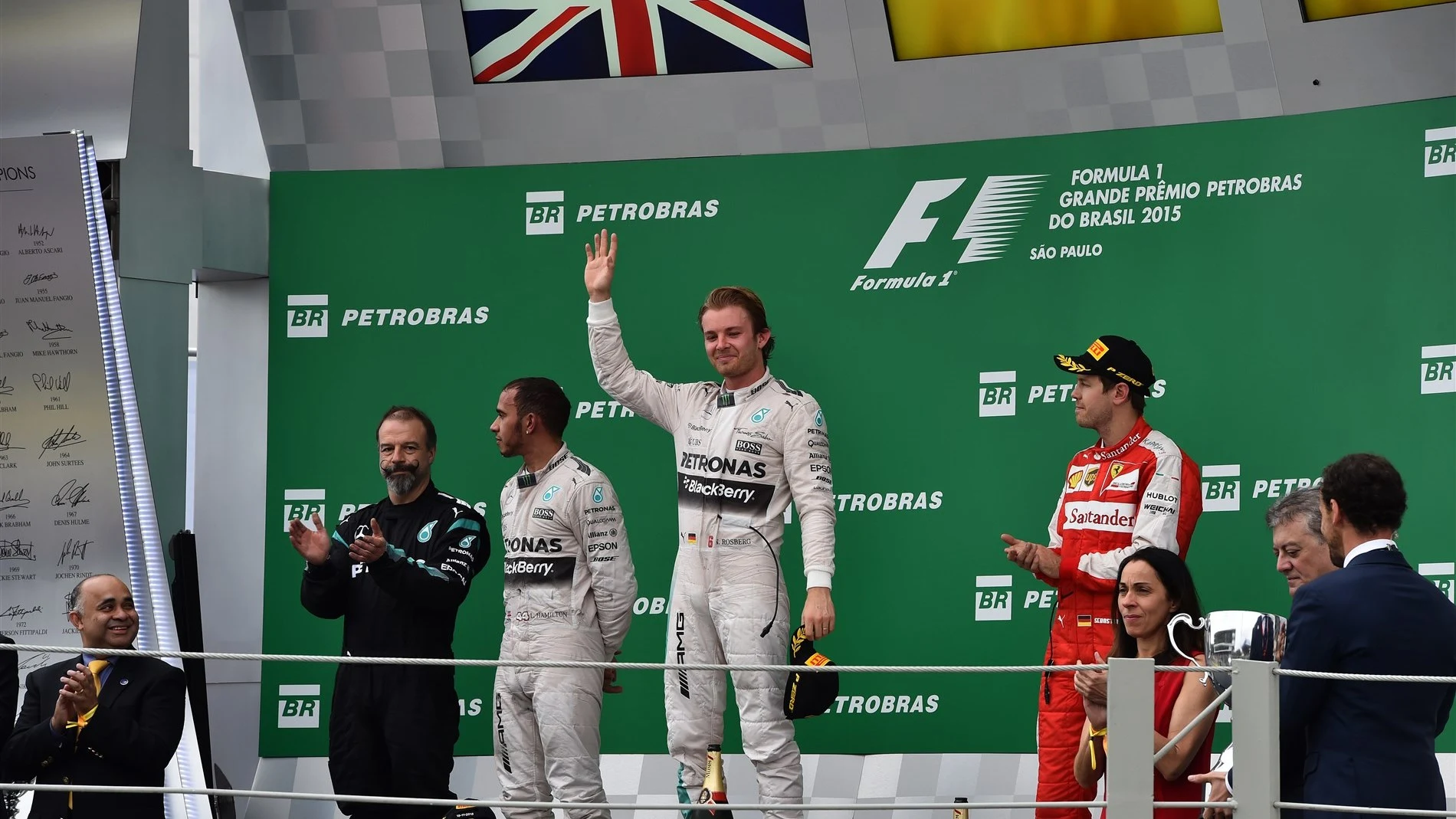 (L to R): Lewis Hamilton (GBR) Mercedes AMG F1, James Waddell (GBR) Mercedes AMG F1 Race Team Composite Technician, race winner Nico Rosberg (GER) Mercedes AMG F1 and Sebastian Vettel (GER) Ferrari celebrate on the podium at Formula One World Championship, Rd18, Brazilian Grand Prix, Race, Interlagos, Sao Paulo, Brazil, Sunday 15 November 2015. © Sutton Motorsport Images