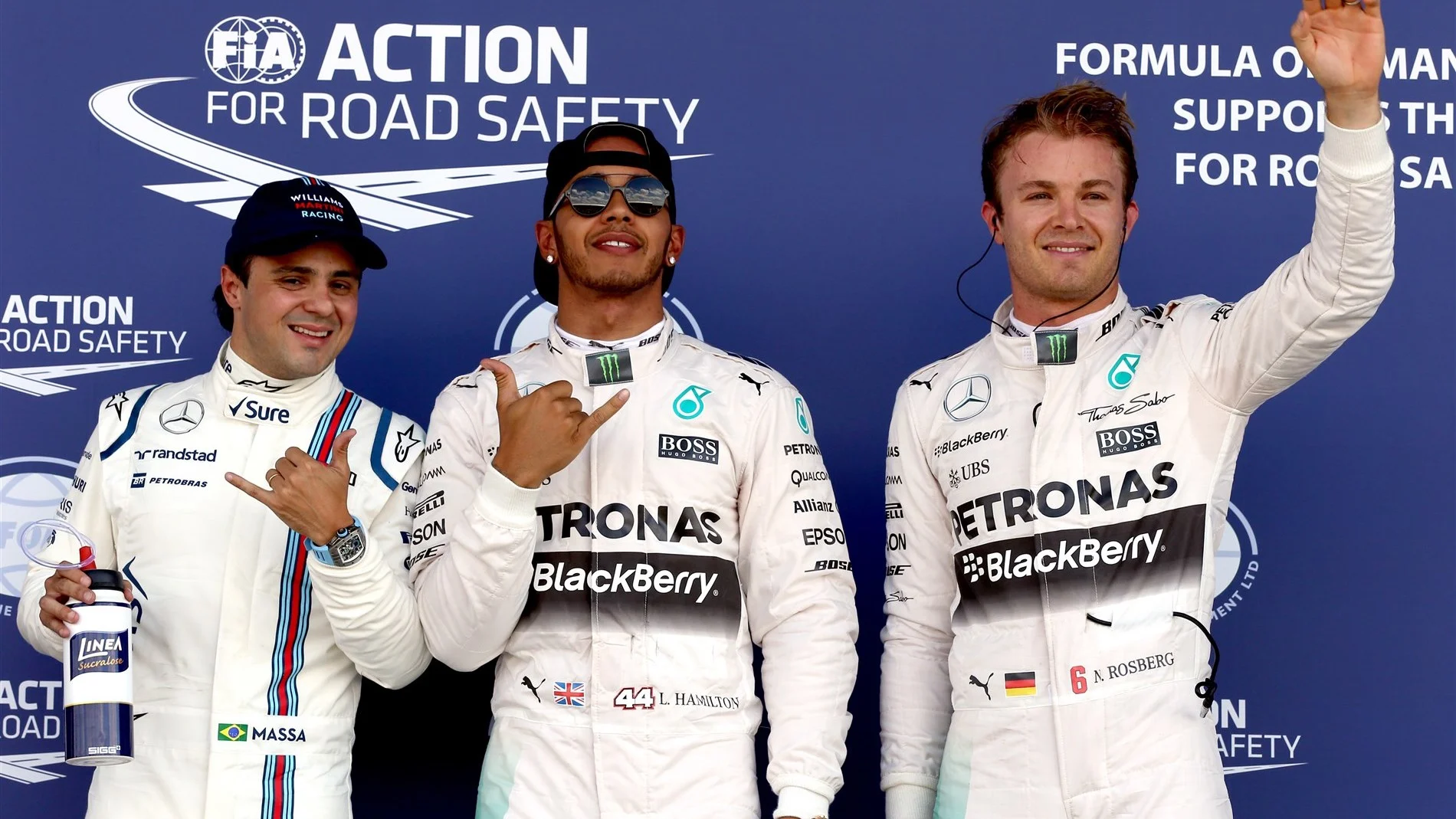 (L to R): Felipe Massa (BRA) Williams, Pole sitter Lewis Hamilton (GBR) Mercedes AMG F1 and Nico Rosberg (GER) Mercedes AMG F1 celebrate in parc ferme at Formula One World Championship, Rd9, British Grand Prix, Qualifying, Silverstone, England, Saturday 4 July 2015. © Sutton Motorsport Images