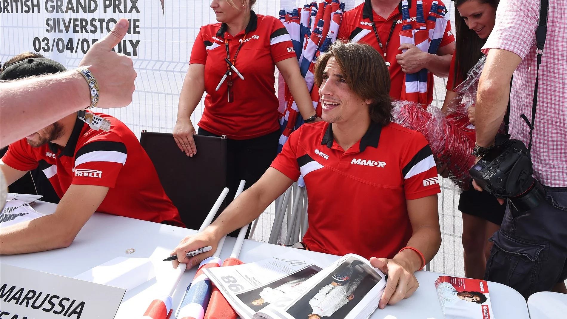 Roberto Merhi (ESP) Manor F1 signs autographs for the fans at Formula One World Championship, Rd9,
