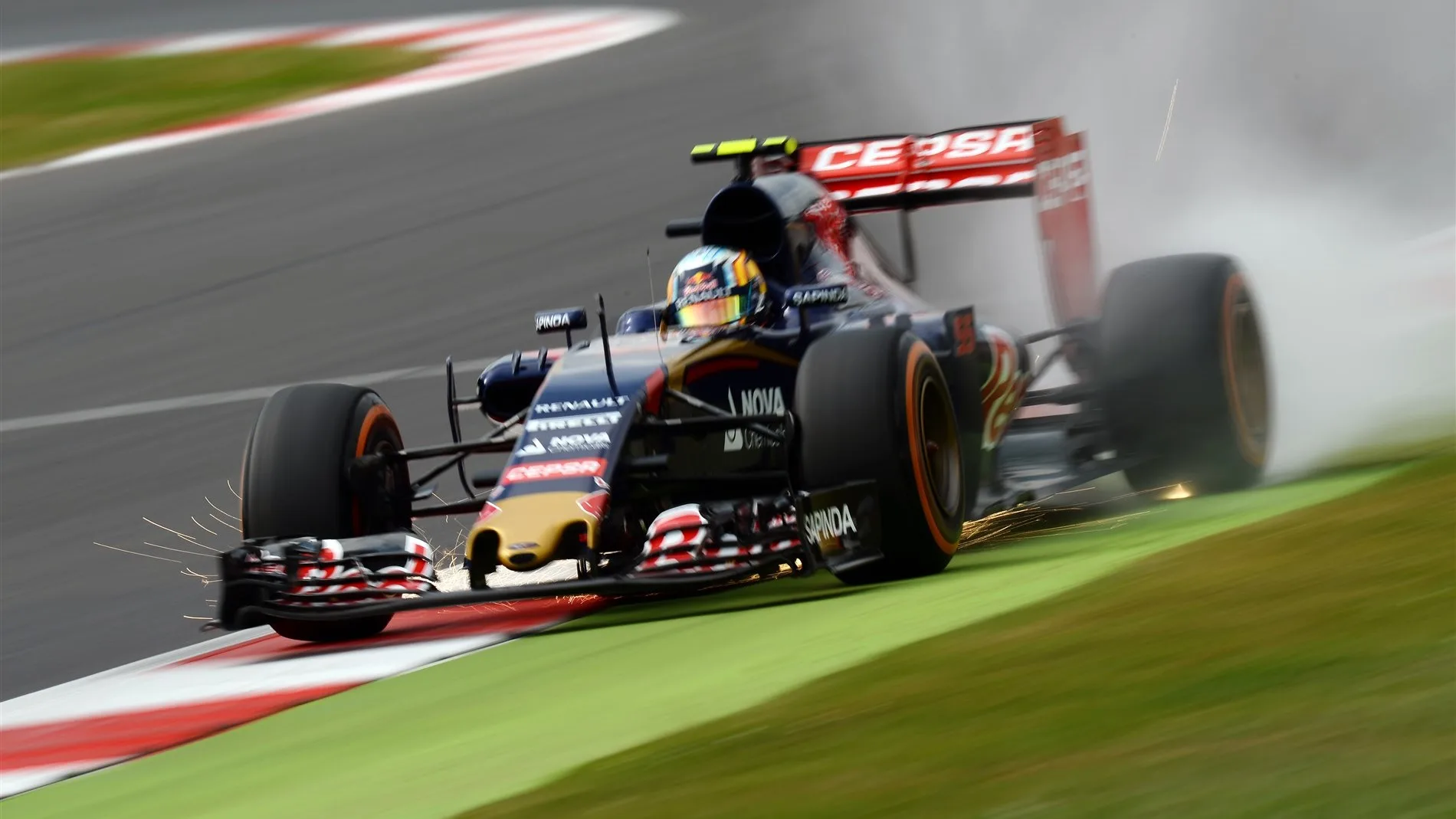 Carlos Sainz jr (ESP) Scuderia Toro Rosso STR10 sparks at Formula One World Championship, Rd9,