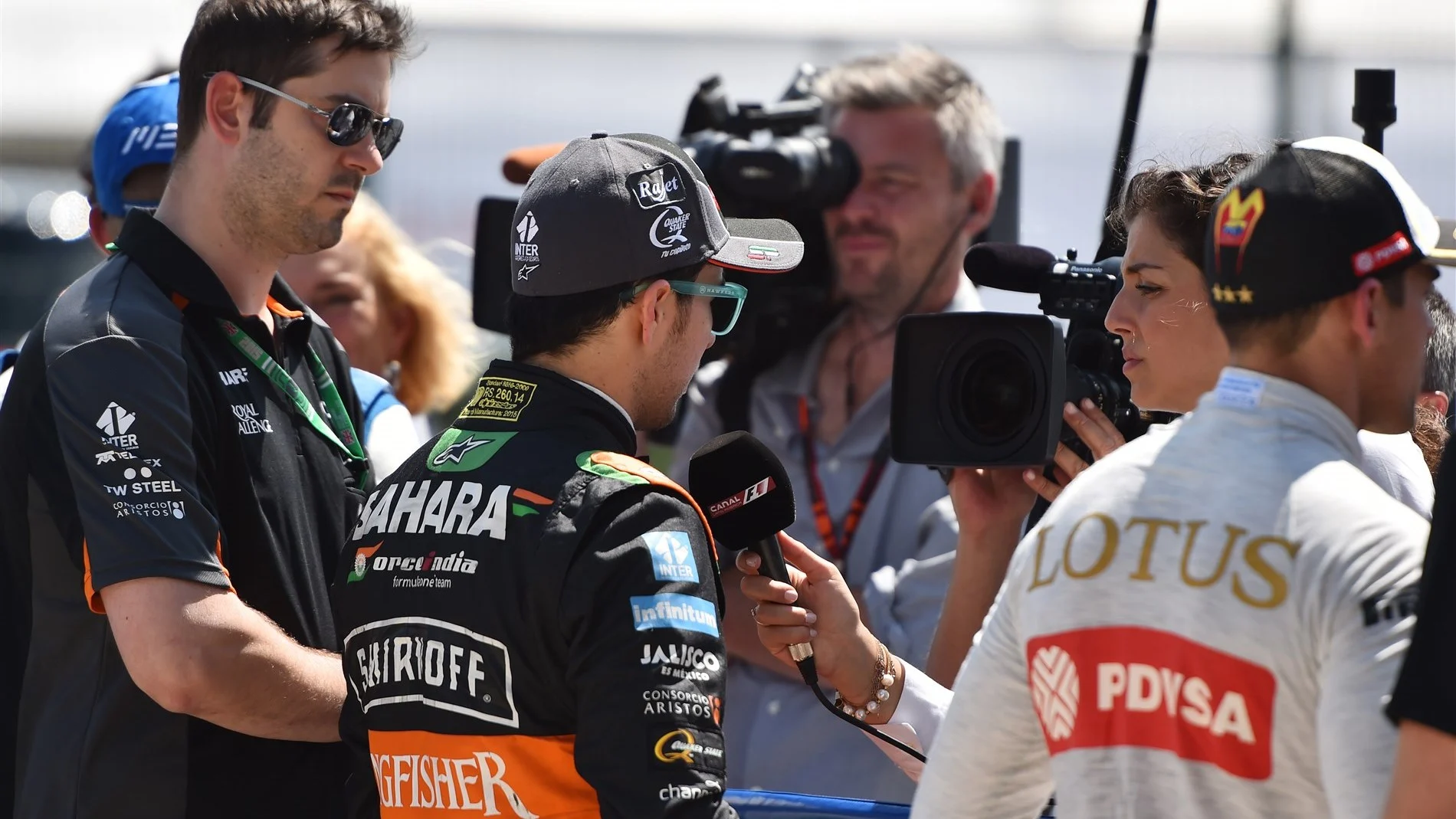 Pastor Maldonado (VEN) Lotus and Sergio Perez (MEX) Force India talk with the media at Formula One