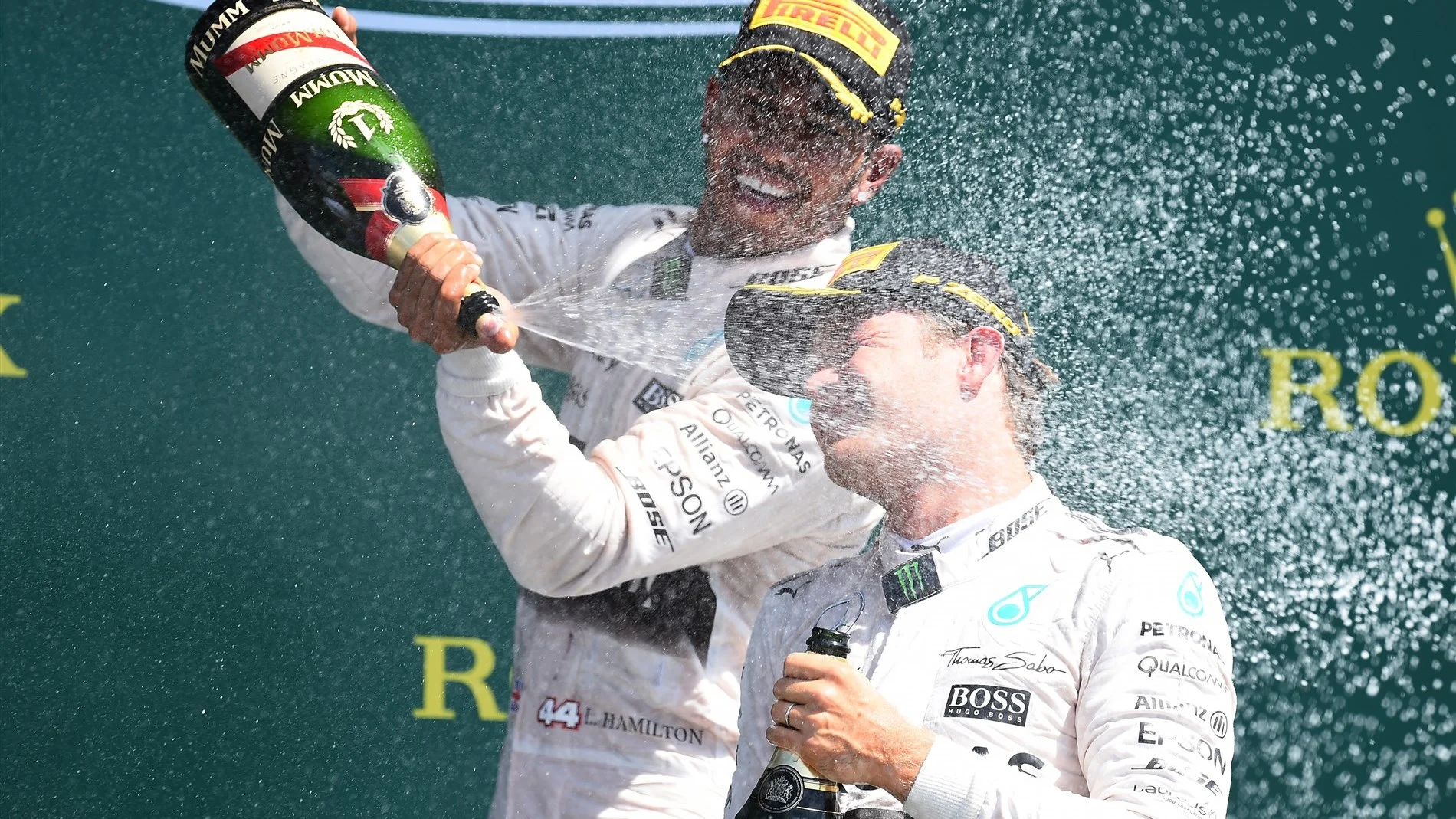 Race winner Lewis Hamilton (GBR) Mercedes AMG F1 and Nico Rosberg (GER) Mercedes AMG F1 celebrate on the podium with the champagne at Formula One World Championship, Rd9, British Grand Prix, Race, Silverstone, England, Sunday 5 July 2015. © Sutton Motorsport Images