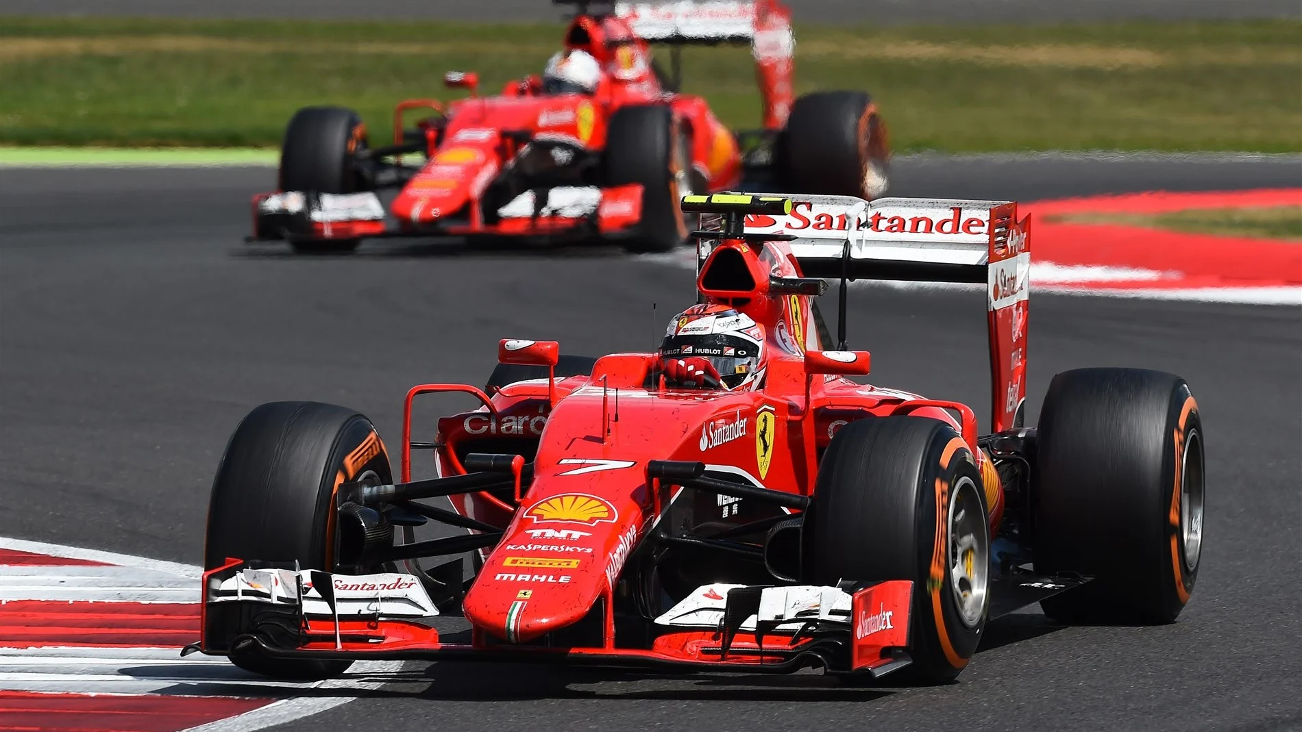 Kimi Raikkonen (FIN) Ferrari SF15-T leads Sebastian Vettel (GER) Ferrari SF15-T at Formula One