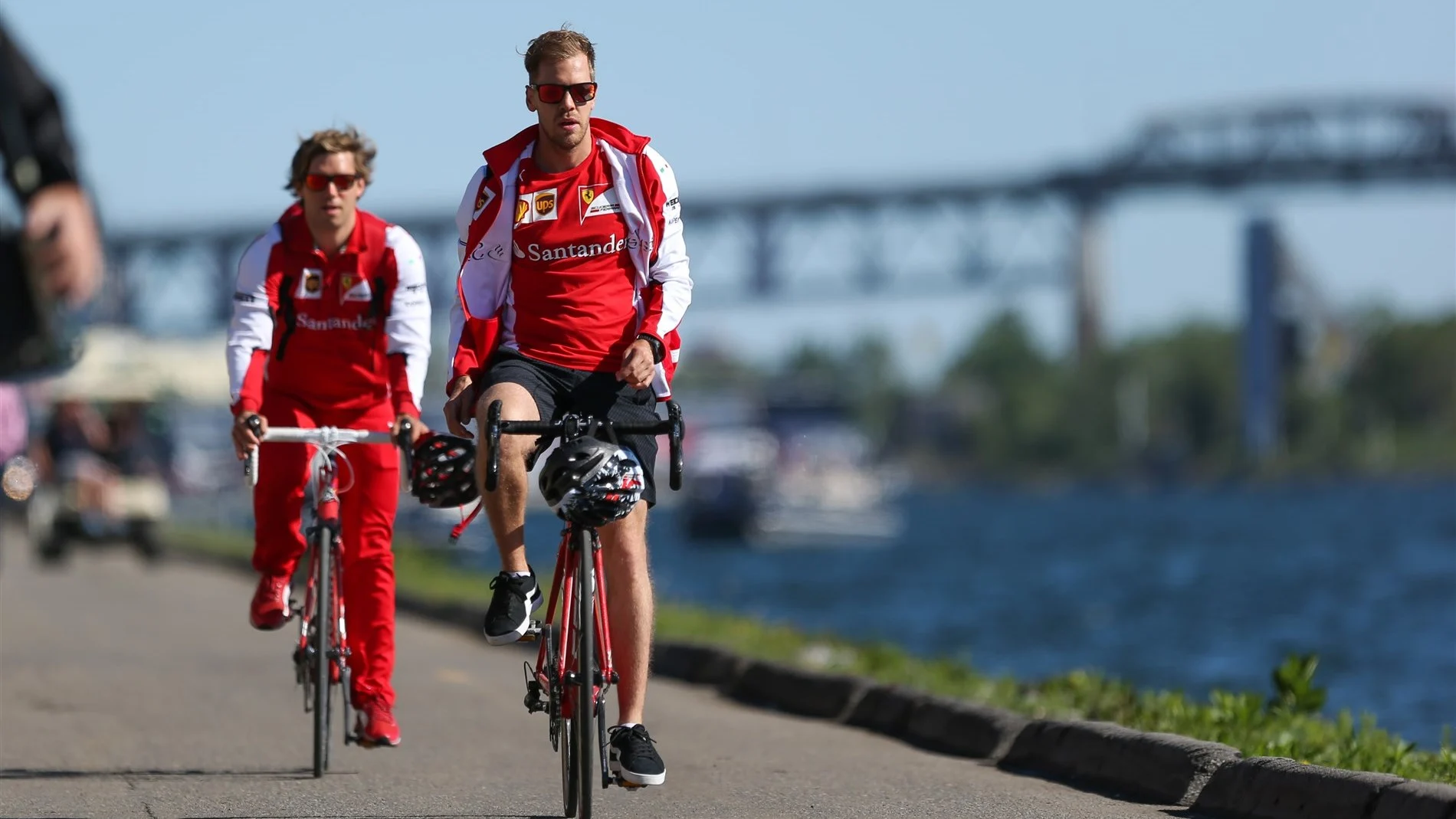 Sebastian Vettel (GER) Ferrari rides a bike at Formula One World Championship, Rd7, Canadian Grand Prix, Qualifying, Montreal, Canada, Saturday 6 June 2015. © Sutton Motorsport Images