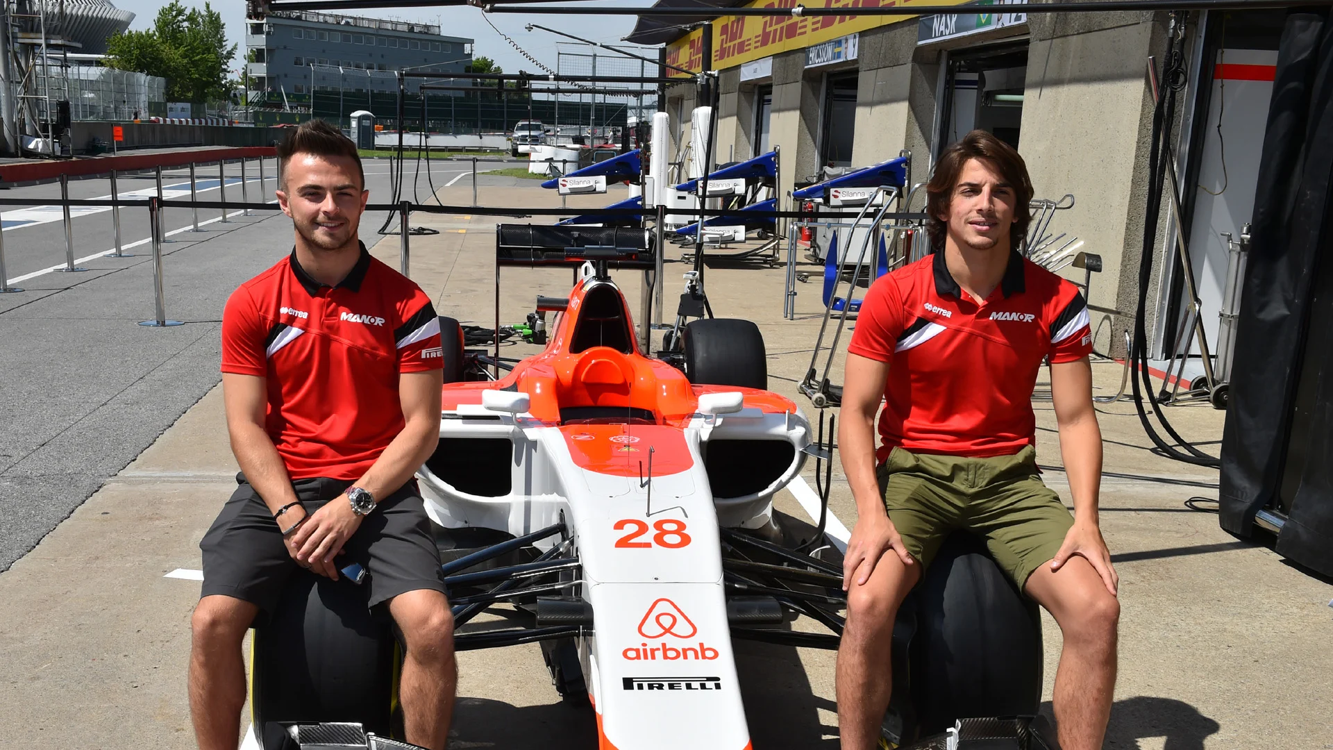 Will Stevens (GBR) Manor GP and Roberto Merhi (ESP) Manor GP at the announcement of airbnb as