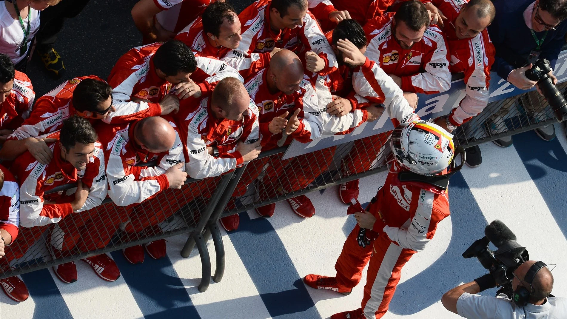 Sebastian Vettel (GER) Ferrari celebrates in parc ferme at Formula One World Championship, Rd3, Chinese Grand Prix, Race, Shanghai, China, Sunday 12 April 2015. © Sutton Motorsport Images