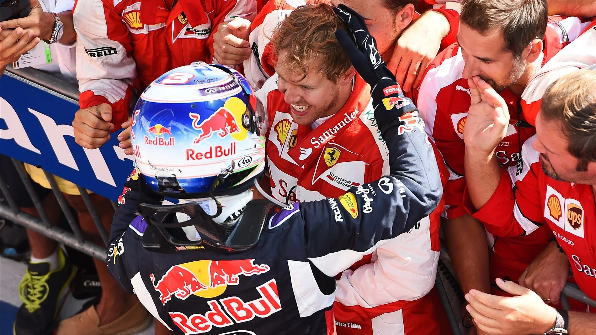 Race winnner Sebastian Vettel (GER) Ferrari celebrates with Daniel Ricciardo (AUS) Red Bull Racing