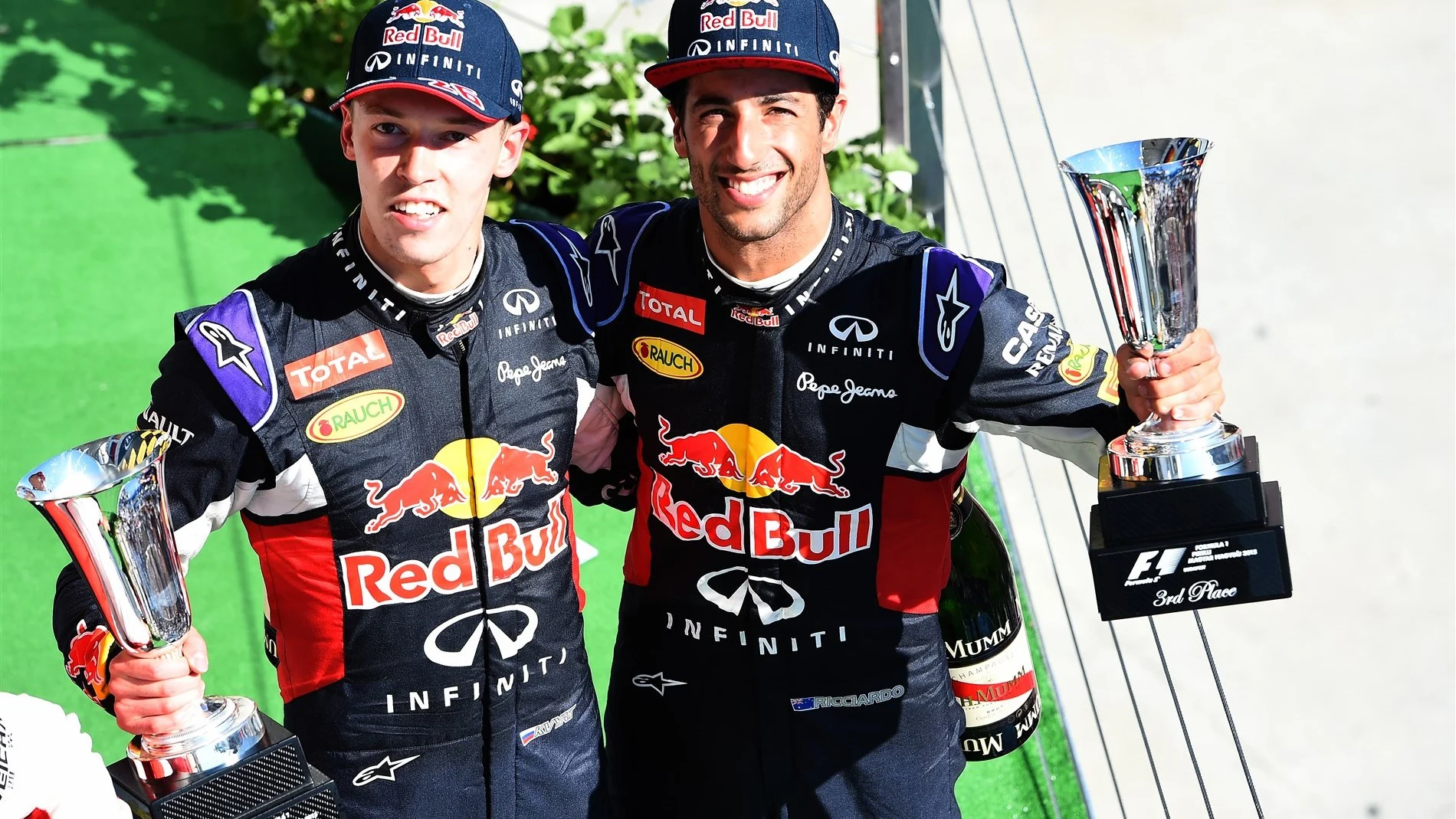 Daniil Kyvat (RUS) Red Bull Racing and Daniel Ricciardo (AUS) Red Bull Racing celebrate on the
