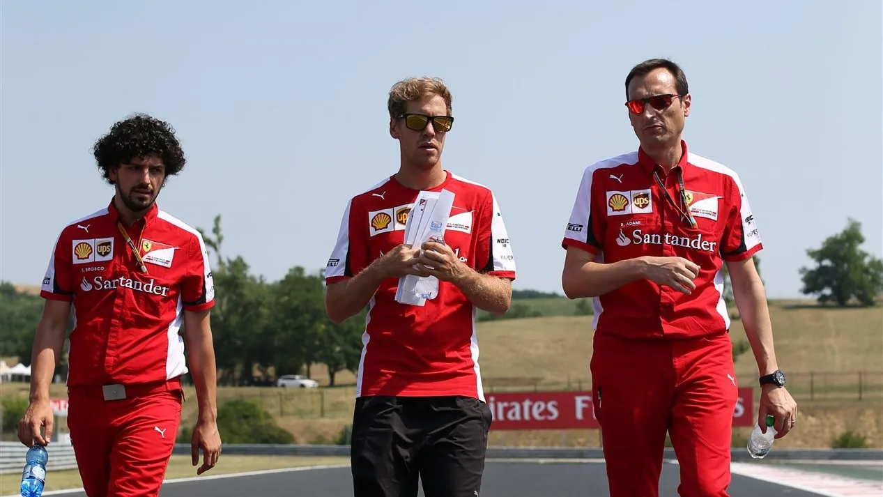 Sebastian Vettel (GER) Ferrari walks the track with Riccardo Adami (ITA) Ferrari Engineer the track at Formula One World Championship, Rd10, Hungarian Grand Prix, Preparations, Hungaroring, Hungary, Thursday 23 July 2015. © Sutton Motorsport Images