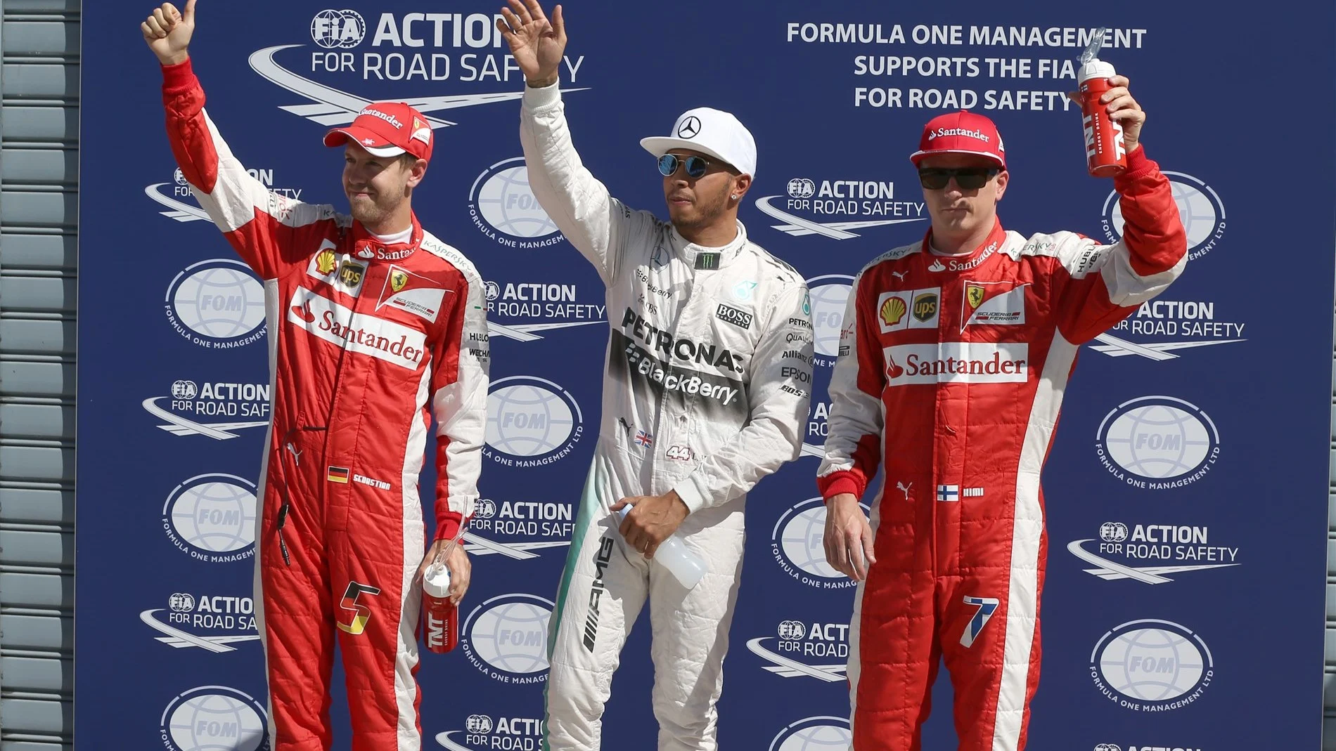 Pole sitter Lewis Hamilton (GBR) Mercedes AMG F1, Sebastian Vettel (GER) Ferrari and Kimi Raikkonen (FIN) Ferrari celebrate in parc ferme at Formula One World Championship, Rd12, Italian Grand Prix, Qualifying, Monza, Italy, Saturday 5 September 2015. © Sutton Motorsport Images