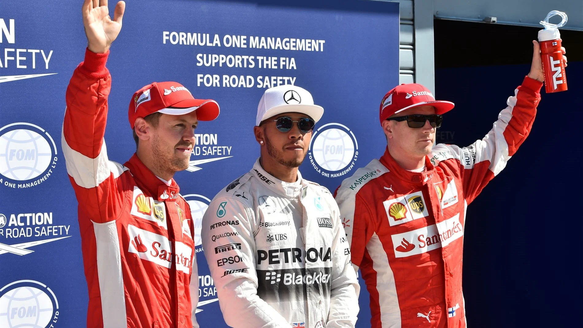 (L to R): Sebastian Vettel (GER) Ferrari, pole sitter Lewis Hamilton (GBR) Mercedes AMG F1 and Kimi