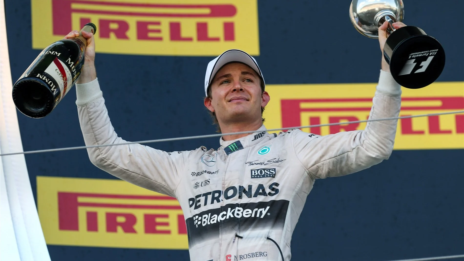 Nico Rosberg (GER) Mercedes AMG F1 celebrates on the podium at Formula One World Championship,