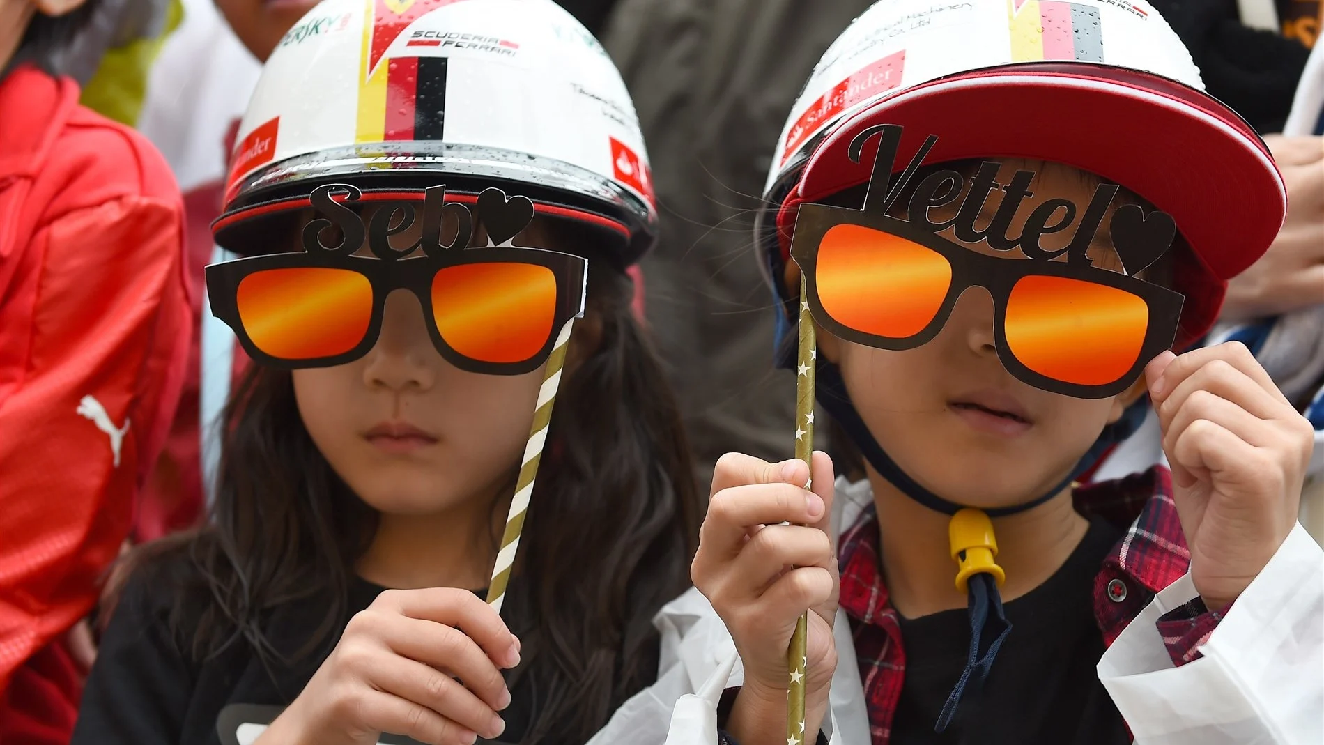 Sebastian Vettel (GER) Ferrari fans at Formula One World Championship, Rd14, Japanese Grand Prix,