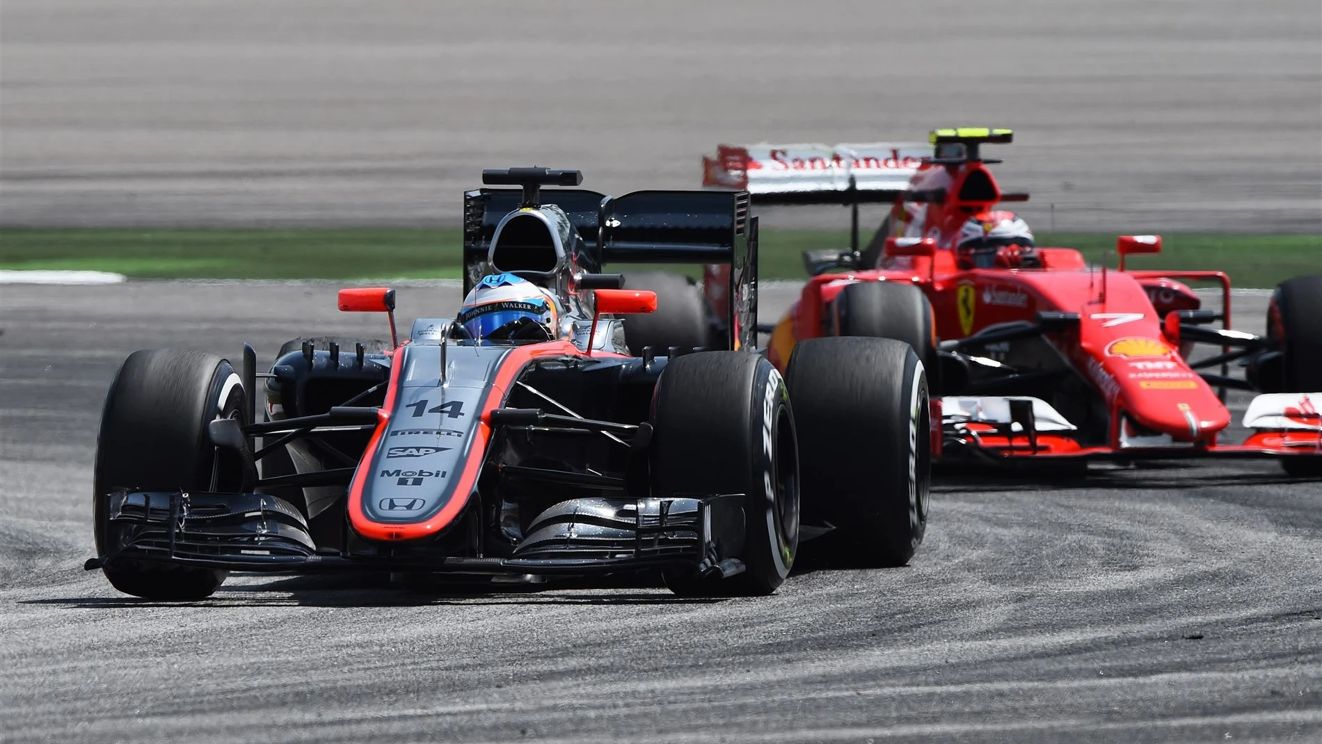 Fernando Alonso (ESP) McLaren MP4-30 leads Kimi Raikkonen (FIN) Ferrari SF15-T at Formula One World Championship, Rd2, Malaysian Grand Prix, Practice, Sepang, Malaysia, Friday 27  March 2015. © Sutton Motorsport Images