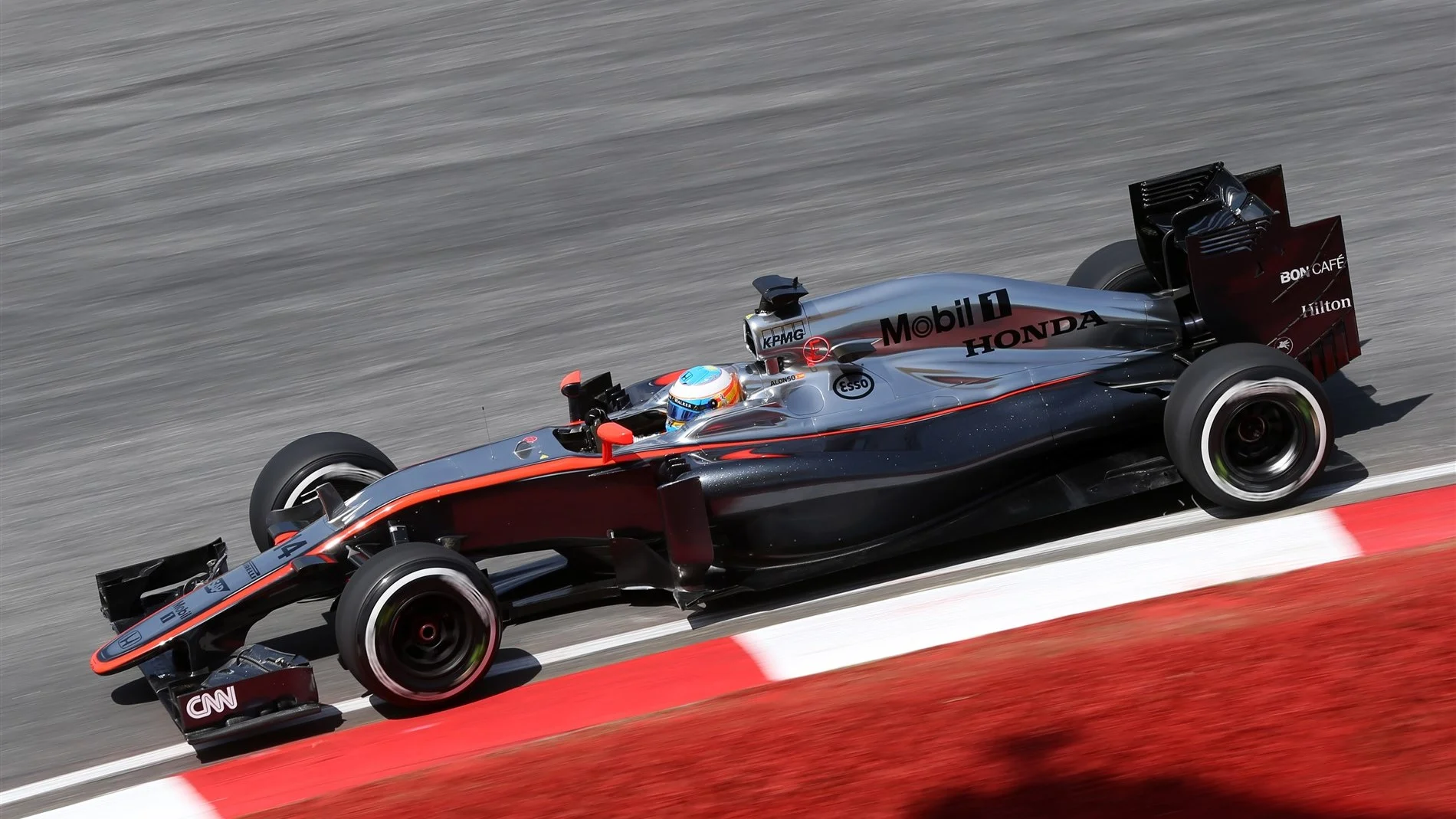 Fernando Alonso (ESP) McLaren MP4-30 at Formula One World Championship, Rd2, Malaysian Grand Prix, Practice, Sepang, Malaysia, Friday 27  March 2015. © Sutton Motorsport Images