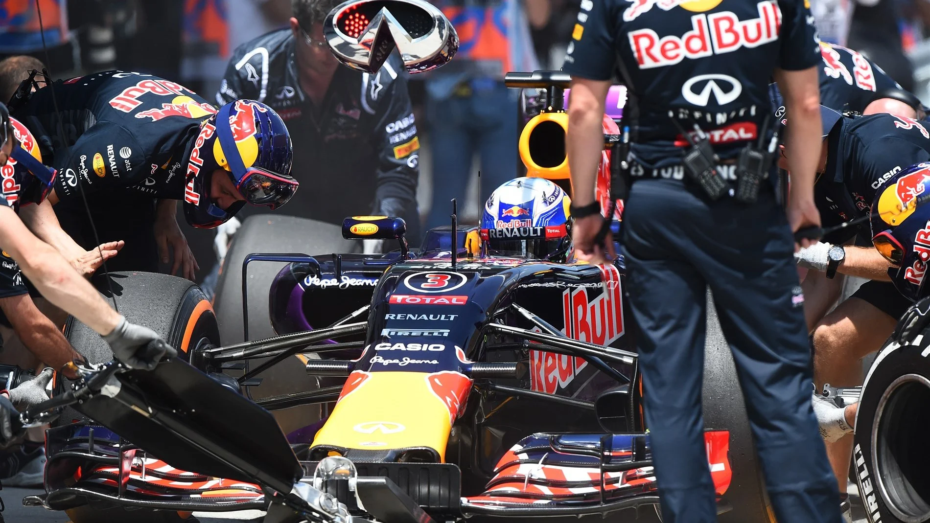 Daniel Ricciardo (AUS) Red Bull Racing RB11 makes a pit stop at Formula One World Championship,