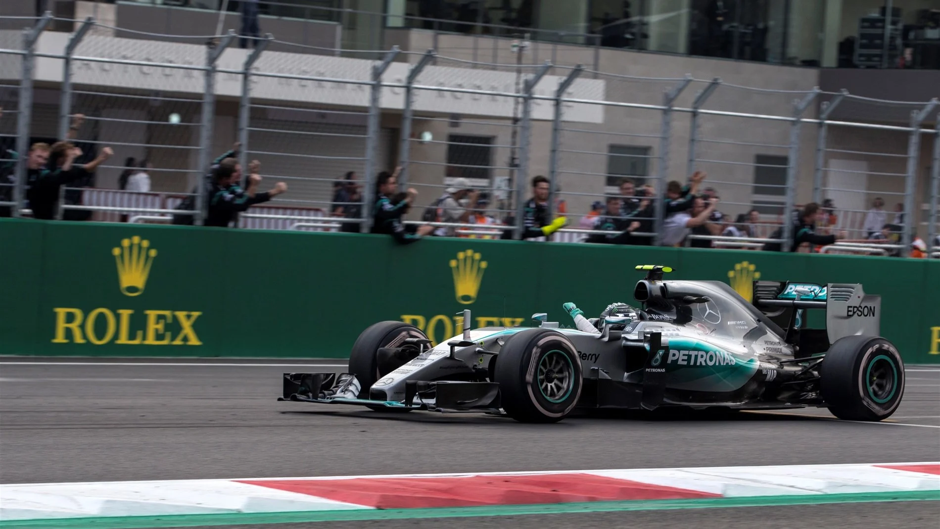 Race winner Nico Rosberg (GER) Mercedes AMG F1 W06 crosses the line at Formula One World