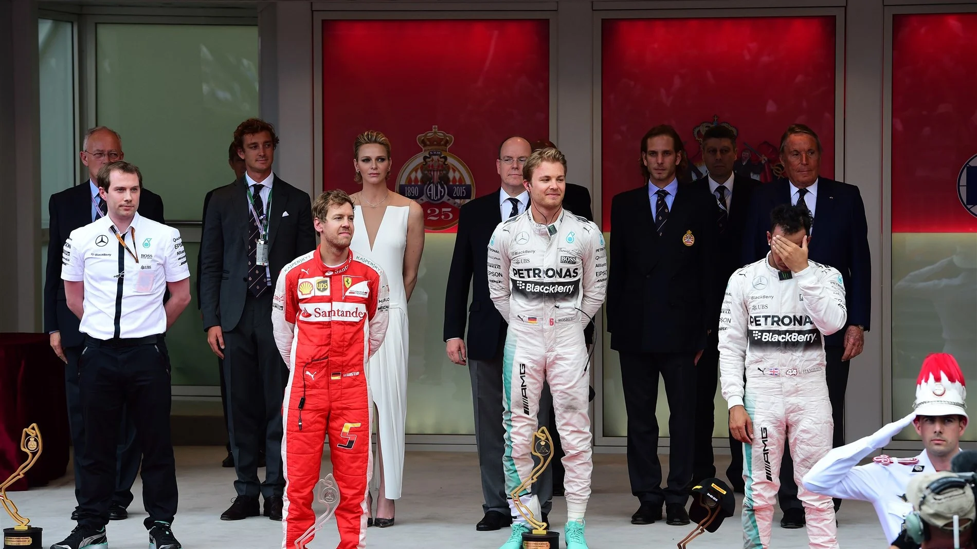 (L to R): Second placed Sebastian Vettel (GER) Ferrari, race winner Nico Rosberg (GER) Mercedes AMG