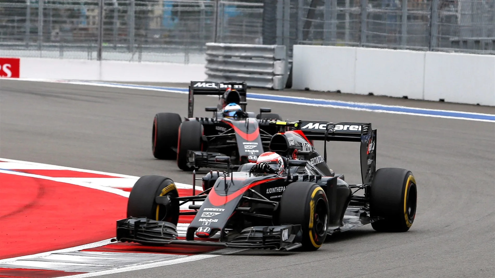 Jenson Button (GBR) McLaren MP4-30 and Fernando Alonso (ESP) McLaren MP4-30 at Formula One World