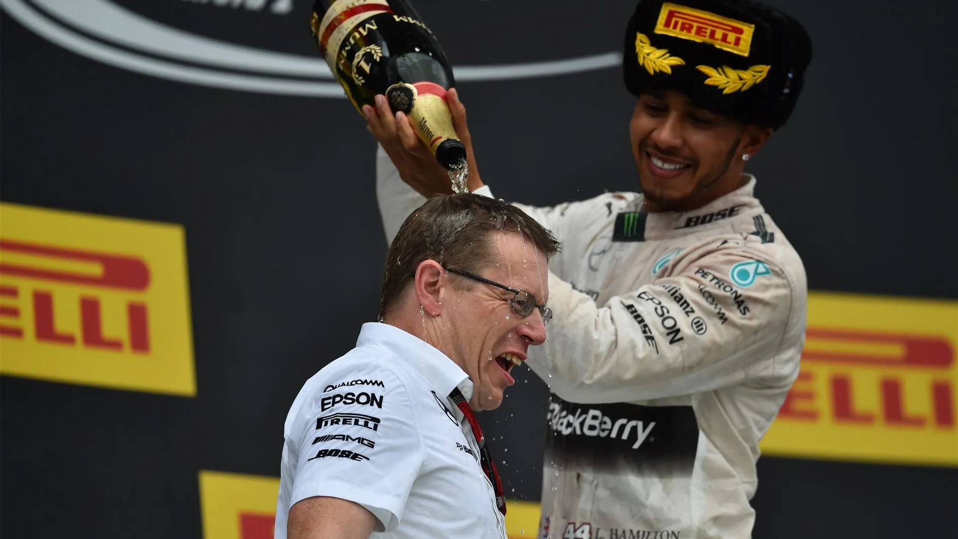 Lewis Hamilton (GBR) Mercedes AMG F1 celebrates with Andy Cowell (GBR) Managing Director, Mercedes