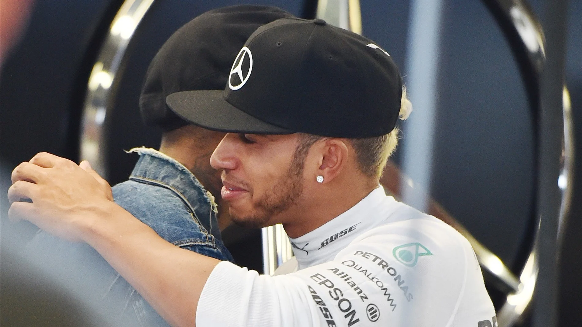 Lewis Hamilton (GBR) Mercedes AMG F1 and Pharrell Williams (USA) in the Mercedes AMG F1 garage at