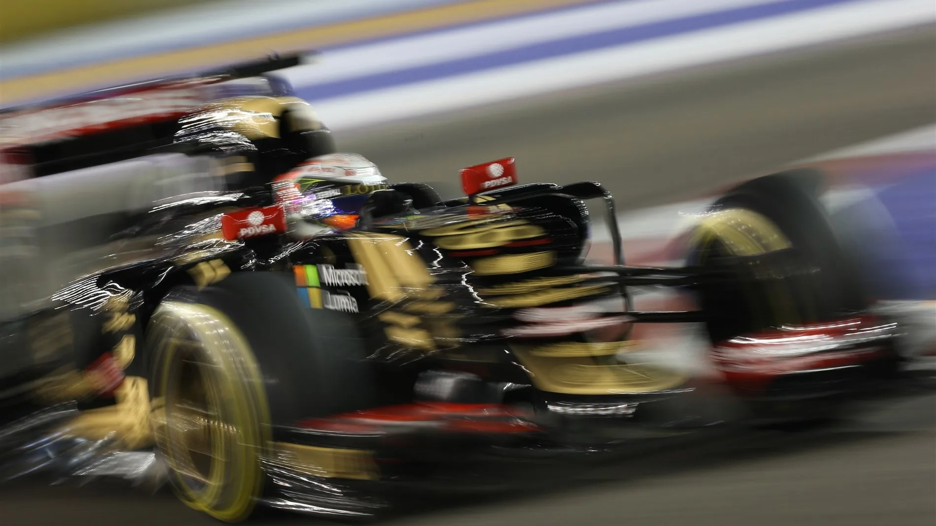 Romain Grosjean (FRA) Lotus E23 Hybrid at Formula One World Championship, Rd13, Singapore Grand