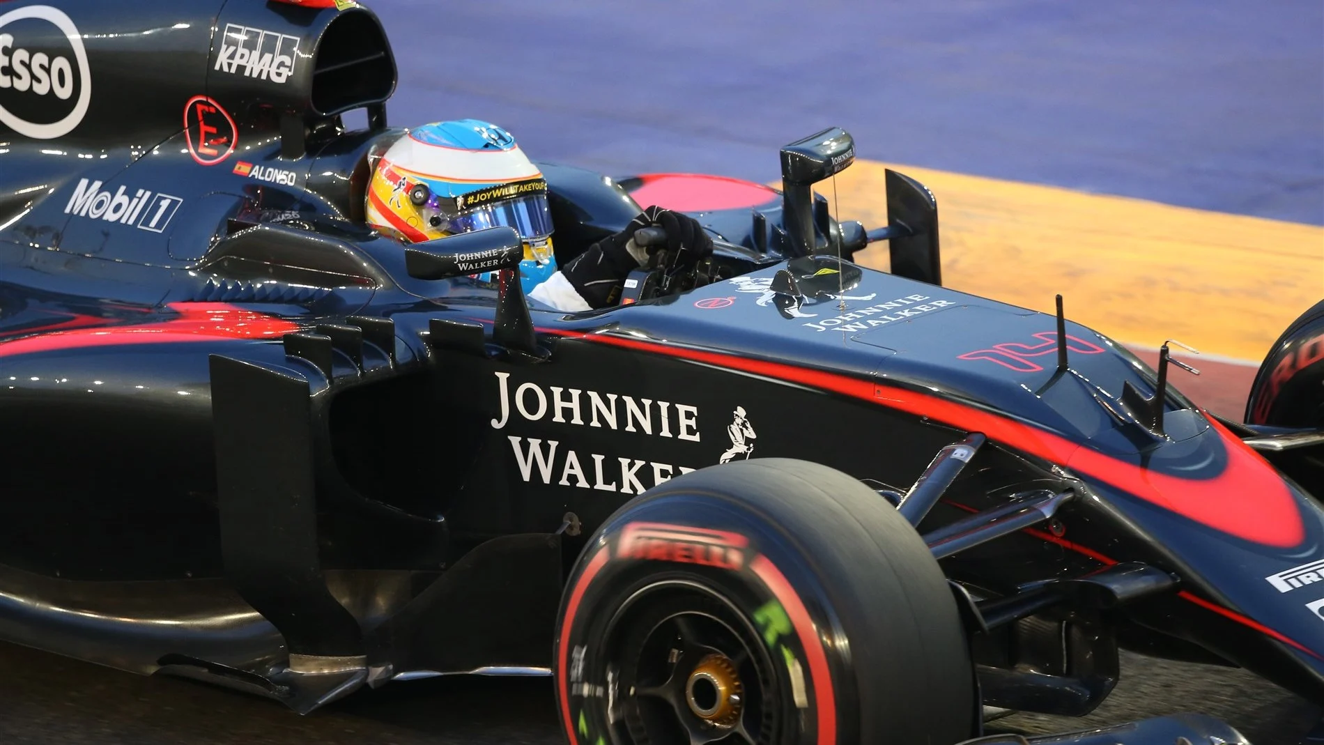 Fernando Alonso (ESP) McLaren MP4-30 at Formula One World Championship, Rd13, Singapore Grand Prix, Race, Marina Bay Street Circuit, Singapore, Sunday 20 September 2015. © Sutton Motorsport Images