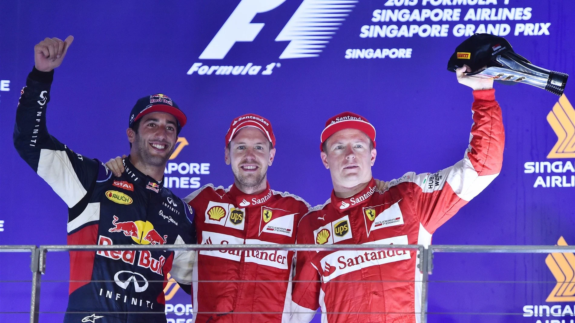 (L to R): Daniel Ricciardo (AUS) Red Bull Racing, race winner Sebastian Vettel (GER) Ferrari and