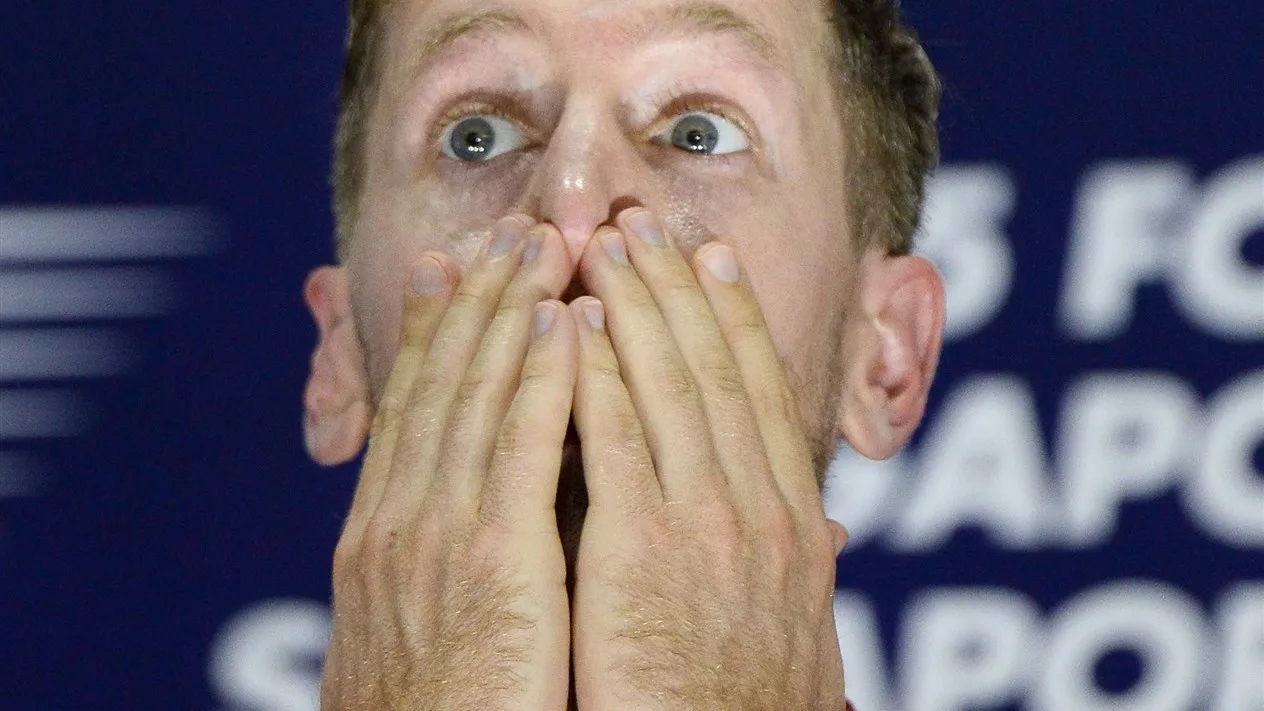 Sebastian Vettel (GER) Ferrari on the podium at Formula One World Championship, Rd13, Singapore Grand Prix, Race, Marina Bay Street Circuit, Singapore, Sunday 20 September 2015. © Sutton Motorsport Images