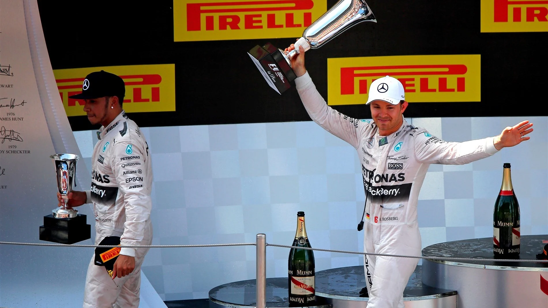 Lewis Hamilton (GBR) Mercedes AMG F1 and Nico Rosberg (GER) Mercedes AMG F1 celebrate with the trophy at Formula One World Championship, Rd5, Spanish Grand Prix Race, Barcelona, Spain, Sunday 10 May 2015. © Sutton Motorsport Images