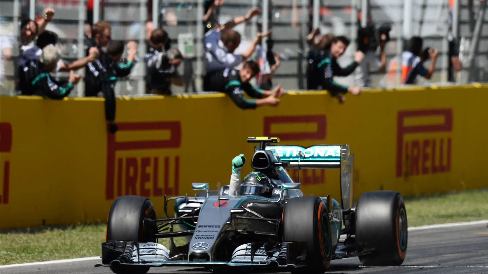 Race winner Nico Rosberg (GER) Mercedes AMG F1 W06 crosses the line at Formula One World