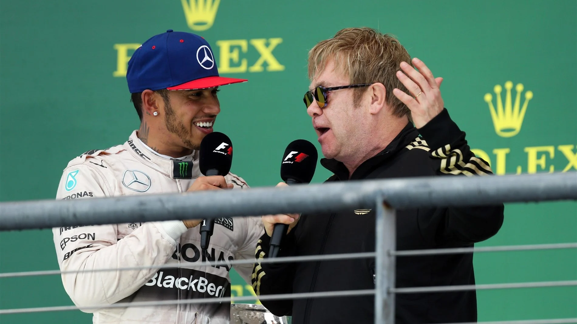 Race winner and new World Champion Lewis Hamilton (GBR) Mercedes AMG F1 celebrates on the podium with Elton John (GBR) at Formula One World Championship, Rd16, United States  Grand Prix, Race, Austin, Texas, USA, Sunday 25 October 2015. © Sutton Motorsport Images