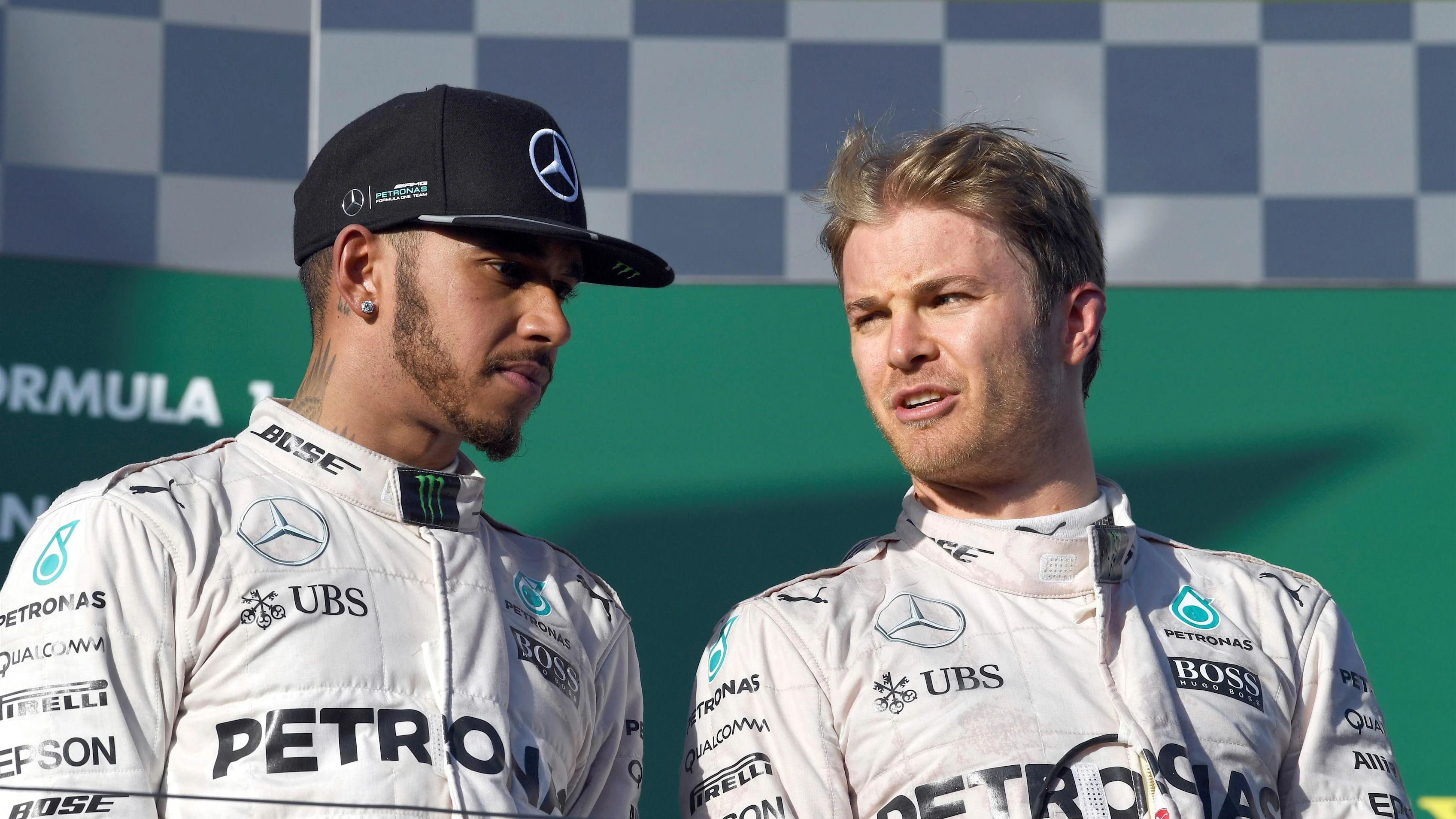 Lewis Hamilton (GBR) Mercedes AMG F1 and race winner Nico Rosberg (GER) Mercedes AMG F1 celebrate on the podium at Formula One World Championship, Rd1, Australian Grand Prix, Race, Albert Park, Melbourne, Australia, Sunday 20 March 2016. © Sutton Motorsport Images