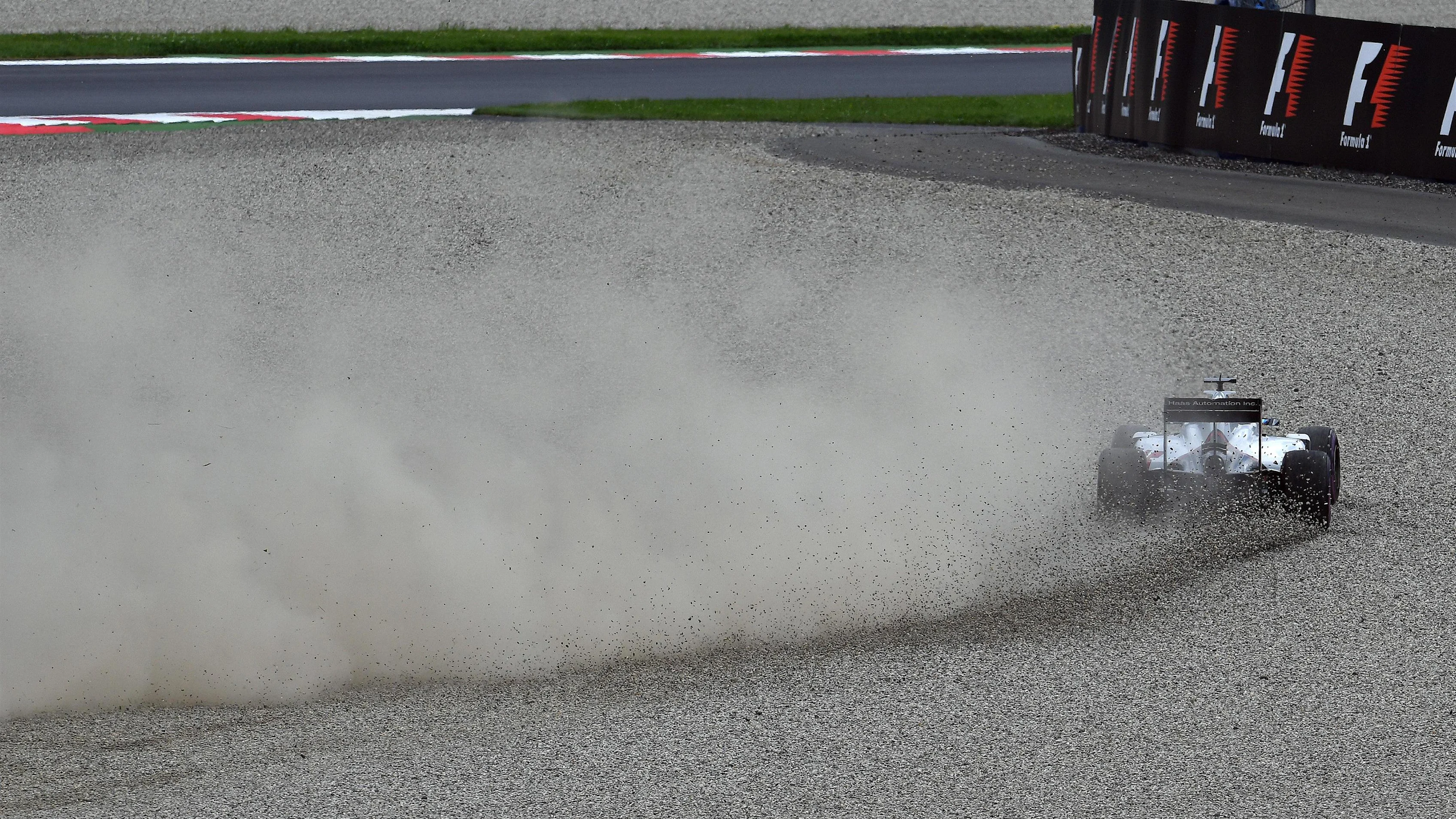 Romain Grosjean (FRA) Haas VF-16 goes through the gravel in Q2 at Formula One World Championship, Rd9, Austrian Grand Prix, Qualifying, Spielberg, Austria, Saturday 2 July 2016. © Sutton Images