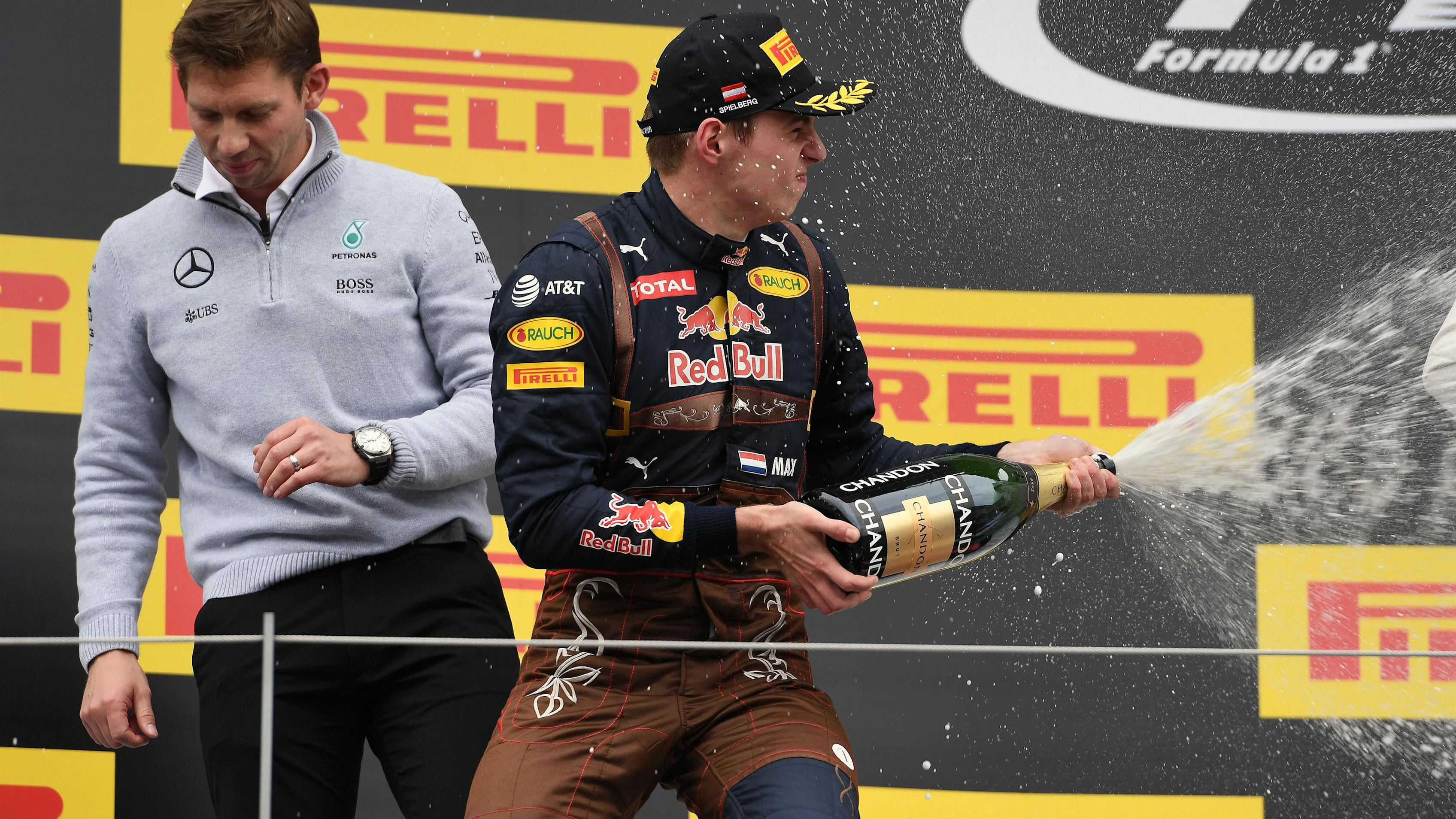 Max Verstappen (NED) Red Bull Racing celebrates on the podium with the champagne at Formula One