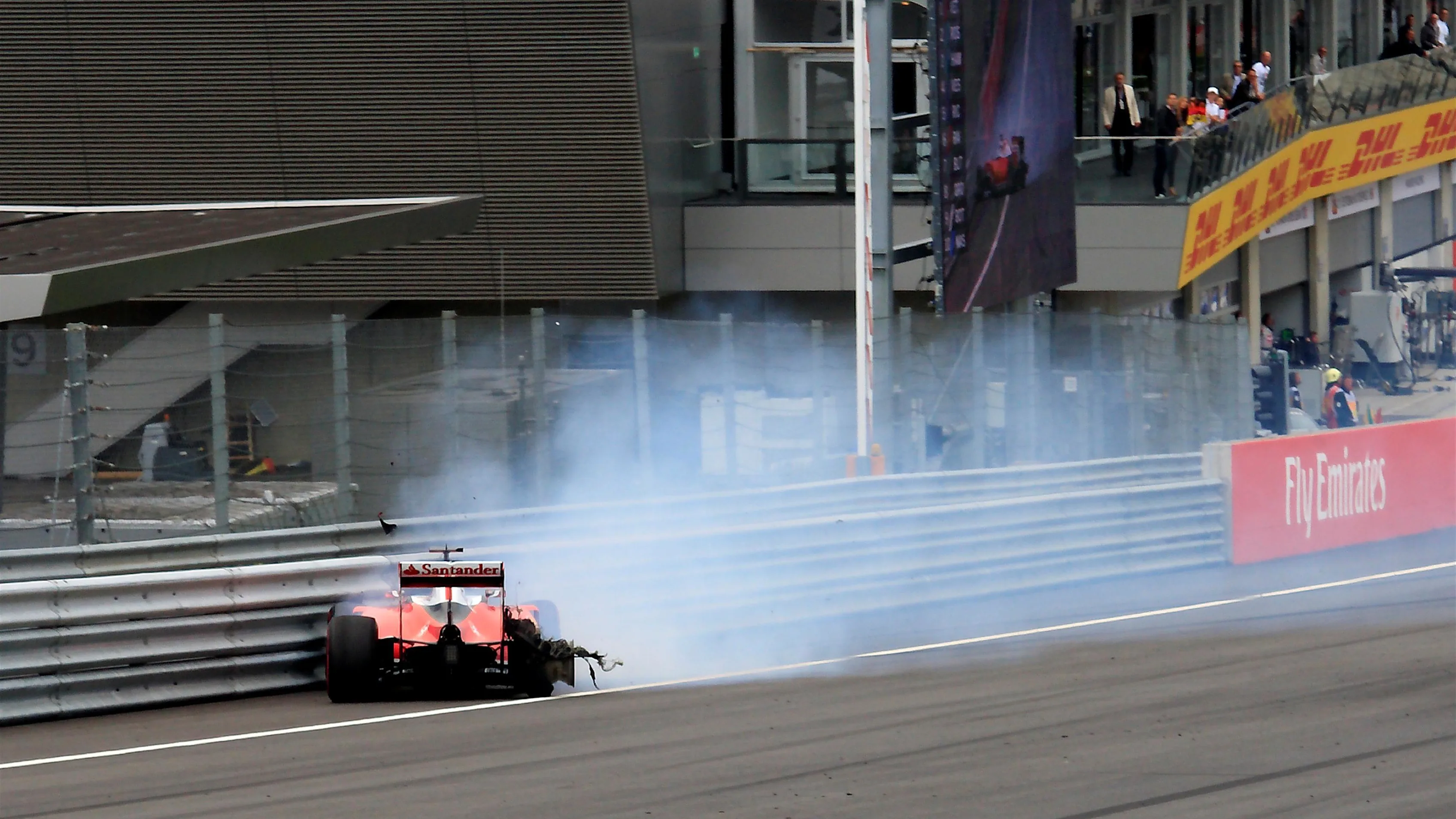 Sebastian Vettel (GER) Ferrari SF16-H crashes out of the race with a blown rear tyre at Formula One