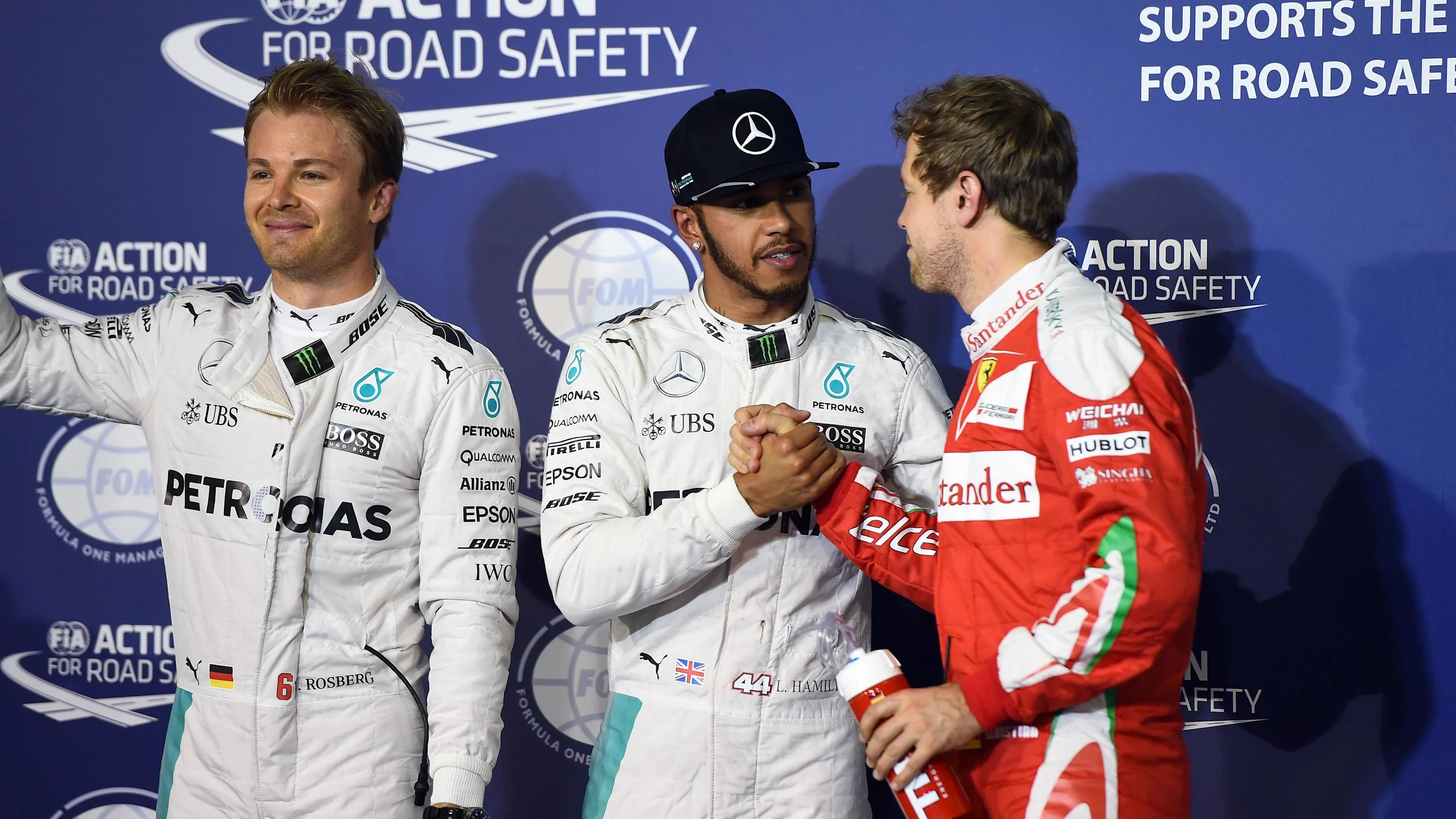 (L to R): Nico Rosberg (GER) Mercedes AMG F1, pole sitter Lewis Hamilton (GBR) Mercedes AMG F1 and Sebastian Vettel (GER) Ferrari celebrate in parc ferme at Formula One World Championship, Rd2, Bahrain Grand Prix Qualifying, Bahrain International Circuit, Sakhir, Bahrain, Saturday 2 April 2016. © Sutton Motorsport Images