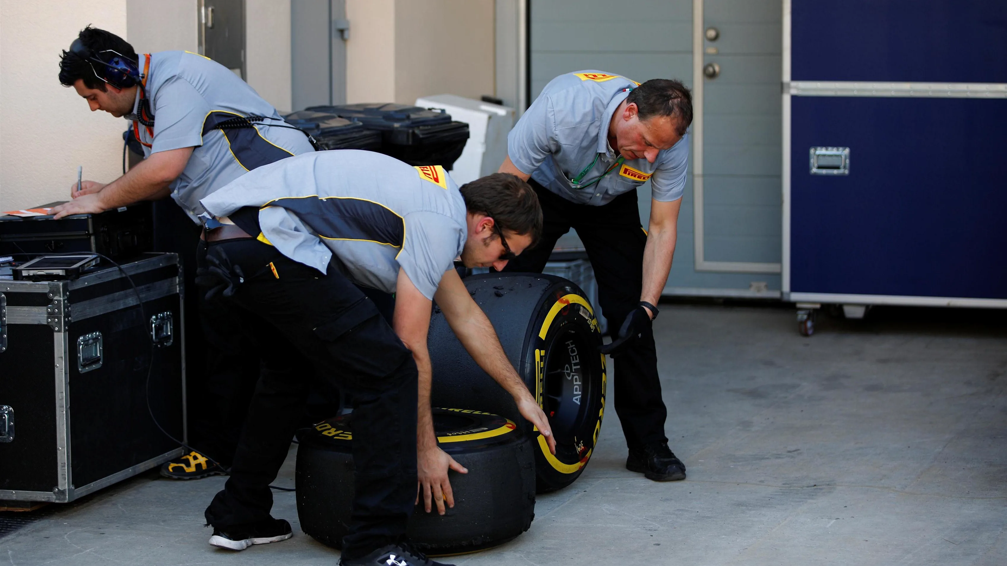Pirelli mechanics with Pirelli tyres at Formula One World Championship, Rd2, Bahrain Grand Prix
