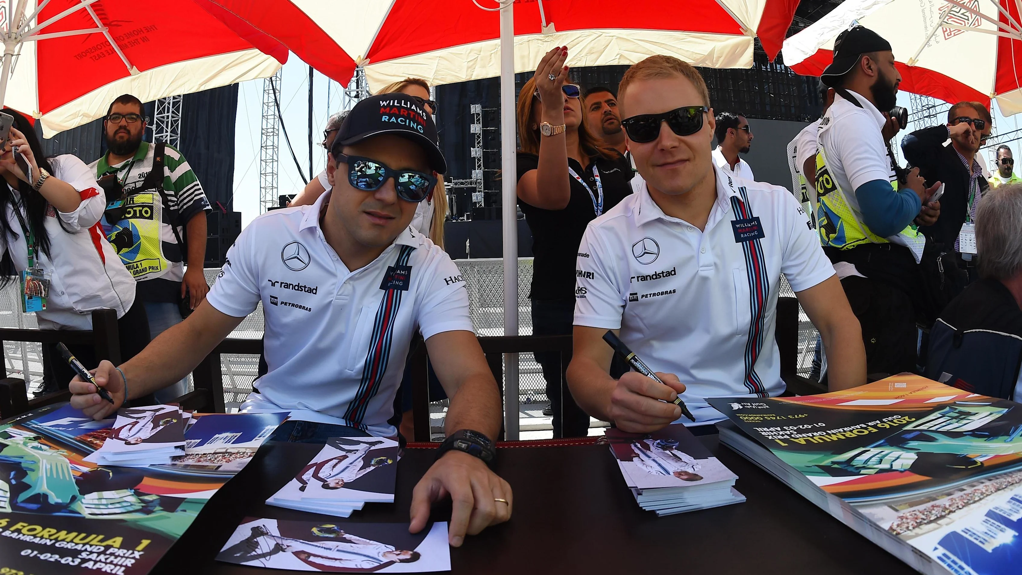 Valtteri Bottas (FIN) Williams and Felipe Massa (BRA) Williams at the autograph session at Formula