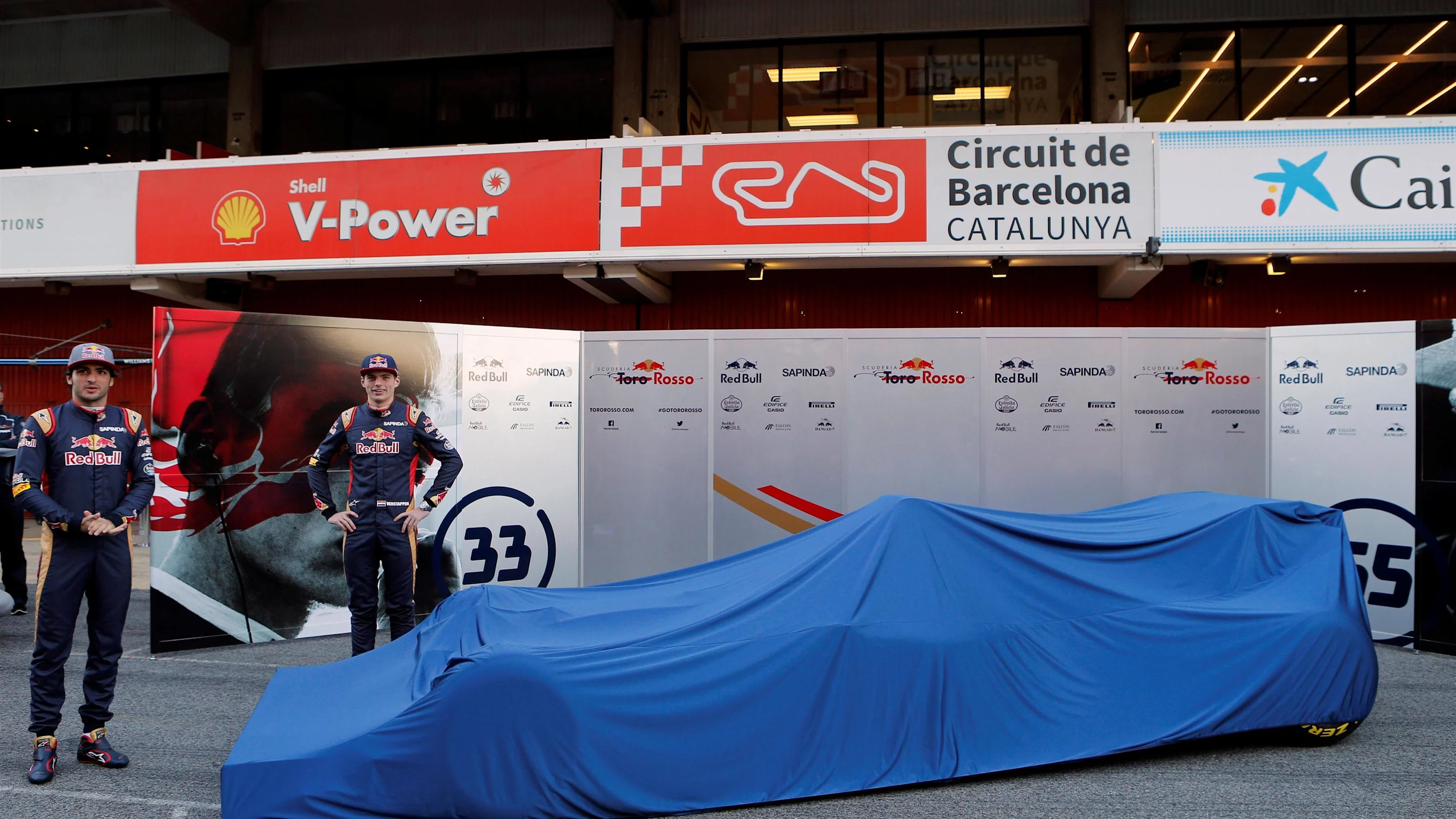Carlos Sainz jr (ESP) Scuderia Toro Rosso and Max Verstappen (NED) Scuderia Toro Rosso with the Scuderia Toro Rosso STR11 under covers at Formula One Testing, Day One, Barcelona, Spain, Tuesday 1 March 2016. © Sutton Motorsport Images