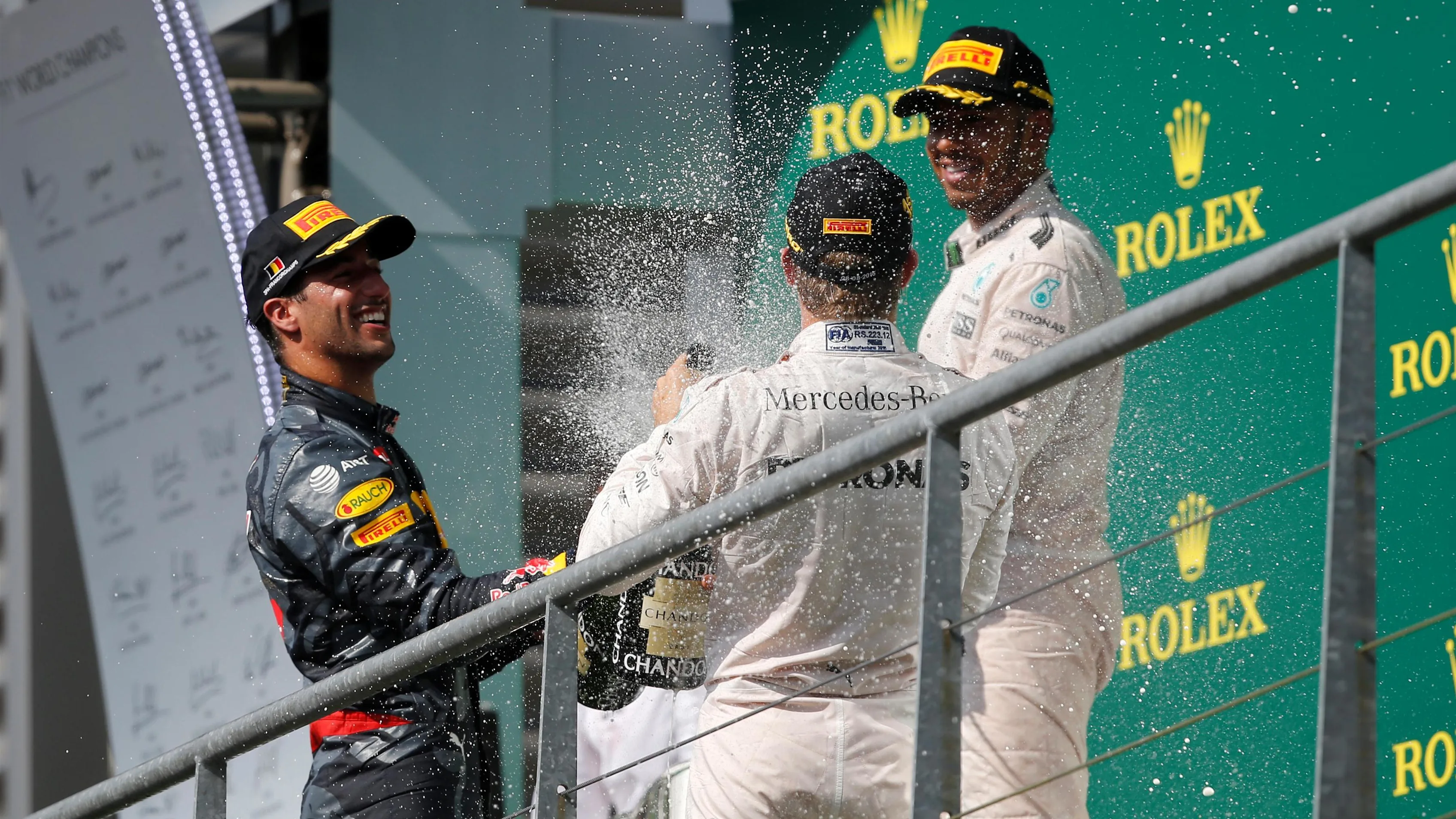 Race winner Nico Rosberg (GER) Mercedes AMG F1 celebrates with the champagne on the podium with Daniel Ricciardo (AUS) Red Bull Racing and Lewis Hamilton (GBR) Mercedes AMG F1 at Formula One World Championship, Rd13, Belgian Grand Prix, Race, Spa Francorchamps, Belgium, Sunday 28 August 2016. © Sutton Images