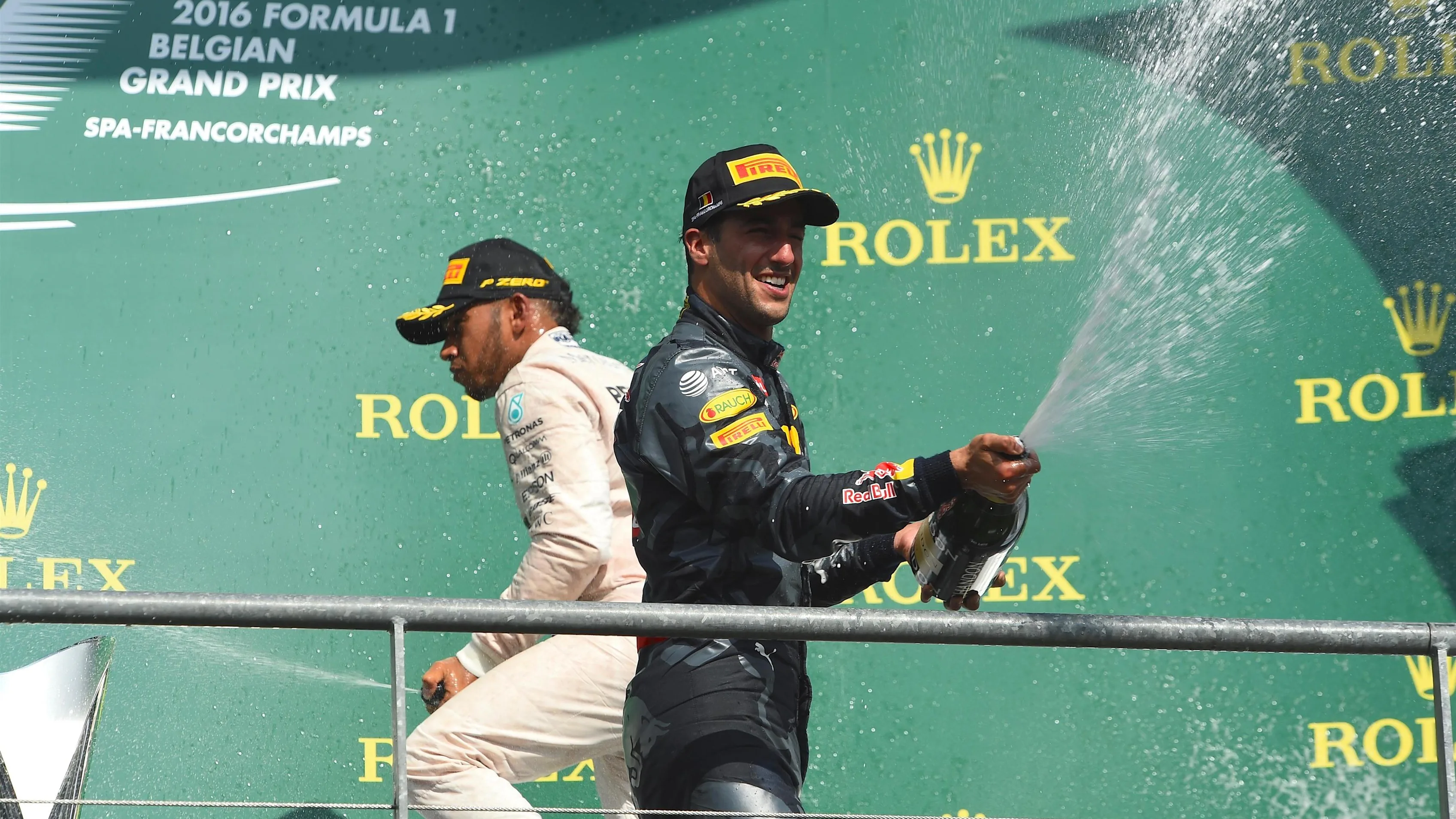 Daniel Ricciardo (AUS) Red Bull Racing and Lewis Hamilton (GBR) Mercedes AMG F1 celebrate on the