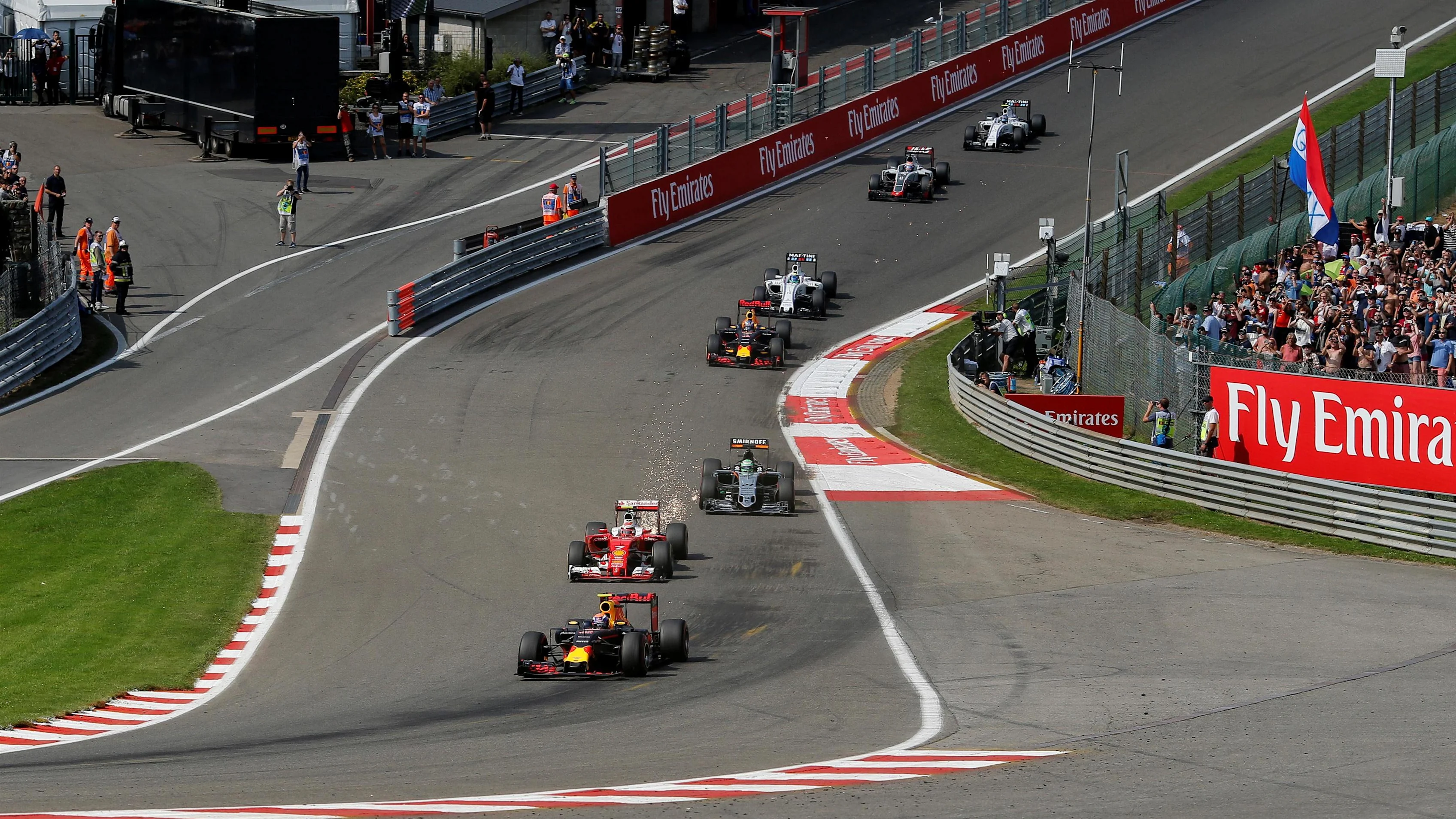 Max Verstappen (NED) Red Bull Racing RB12 and Kimi Raikkonen (FIN) Ferrari SF16-H with front