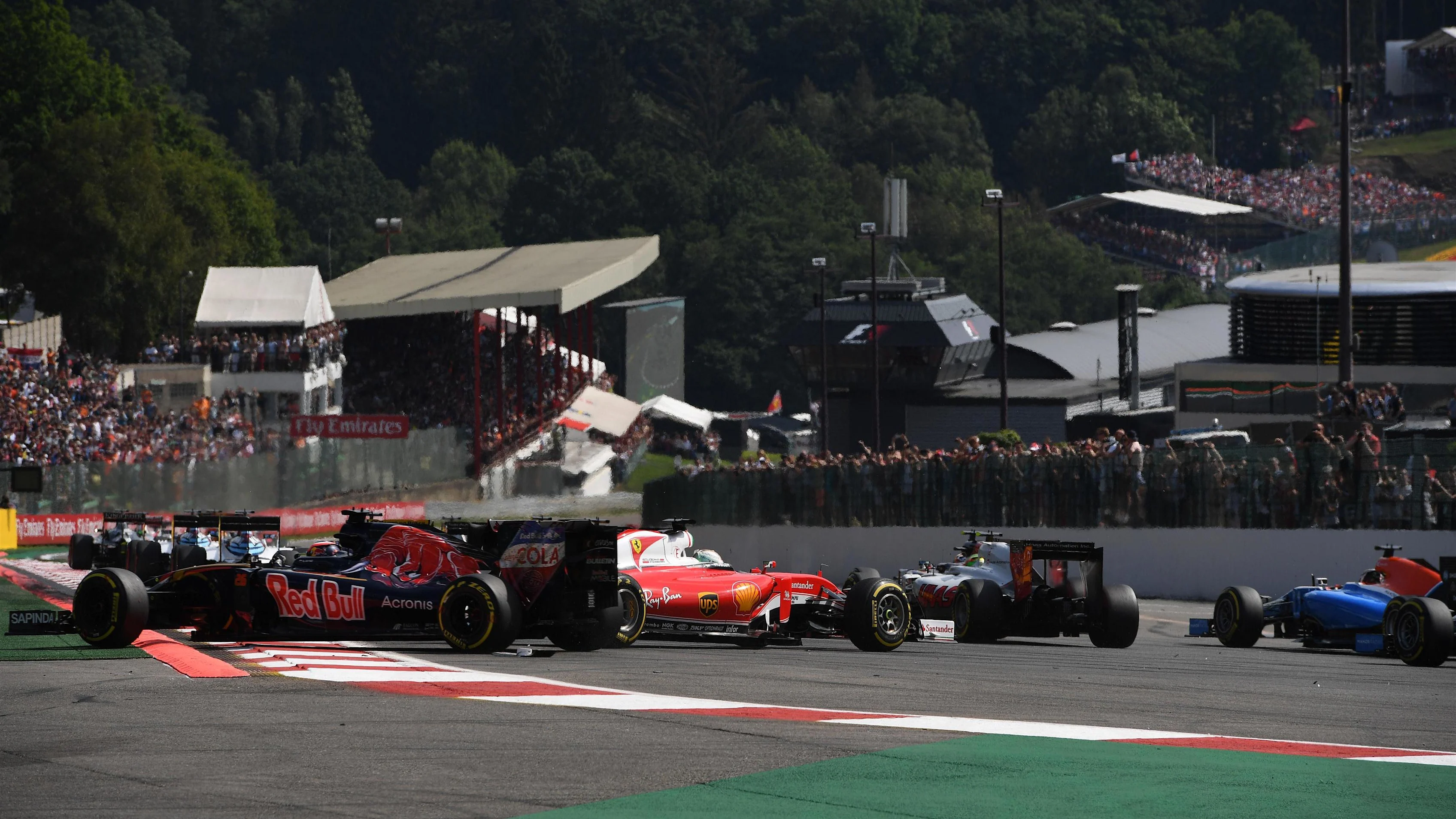 Sebastian Vettel (GER) Ferrari SF16-H and Kimi Raikkonen (FIN) Ferrari SF16-H collide at the start