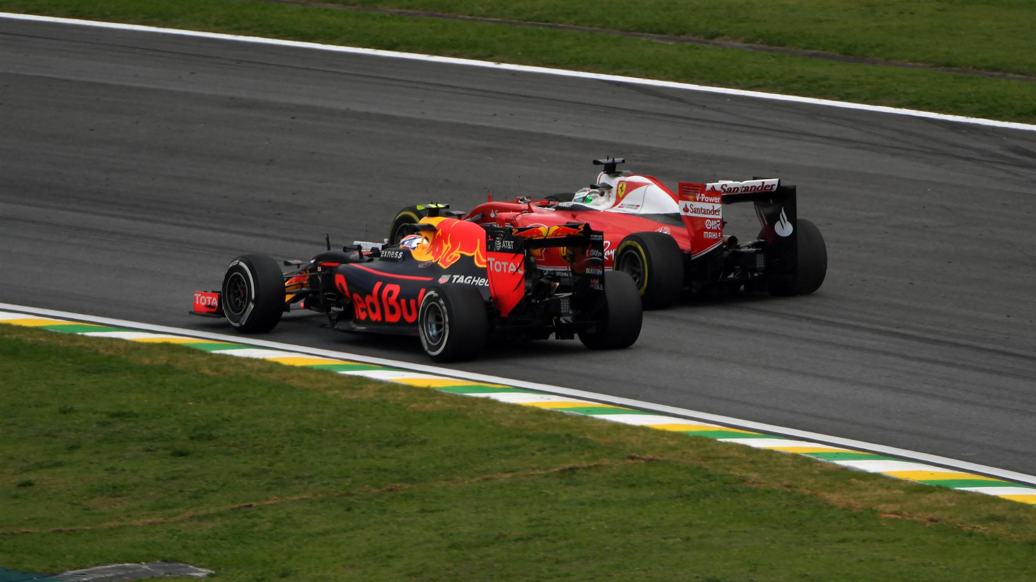 Sebastian Vettel (GER) Ferrari SF16-H and Max Verstappen (NED) Red Bull Racing RB12 at Formula One