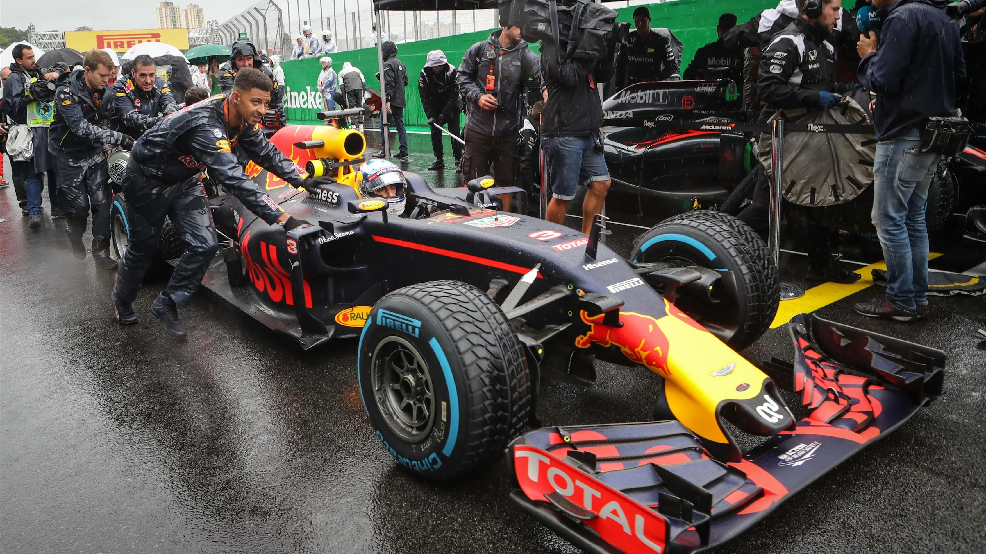 Daniel Ricciardo (AUS) Red Bull Racing RB12 on the grid at Formula One World Championship, Rd20,