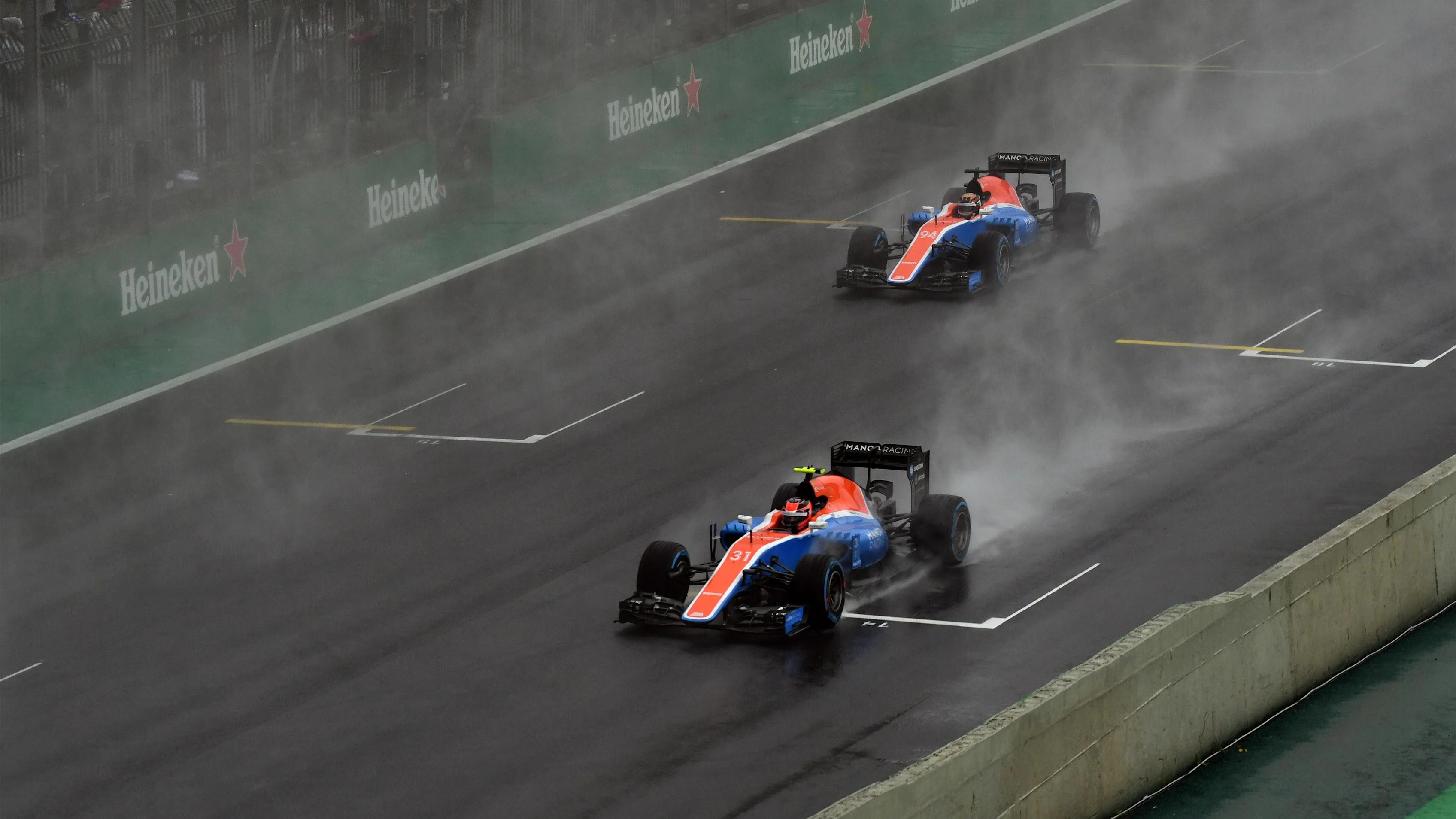 Esteban Ocon (FRA) Manor Racing MRT05 and Pascal Wehrlein (GER) Manor Racing MRT05 at Formula One World Championship, Rd20, Brazilian Grand Prix, Race, Interlagos, Sao Paulo, Brazil, Sunday 13 November 2016. © Sutton Images