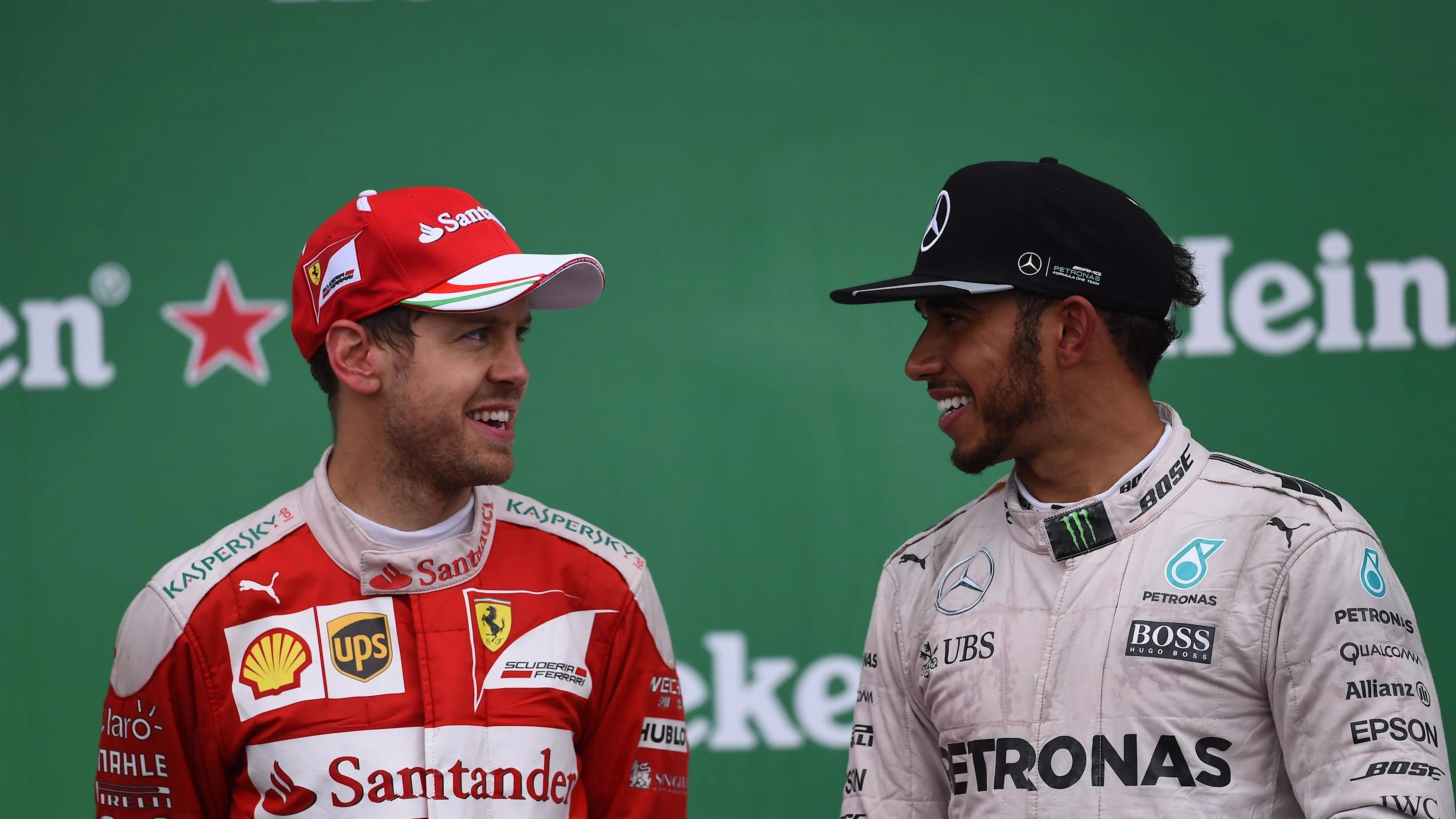 Sebastian Vettel (GER) Ferrari and Lewis Hamilton (GBR) Mercedes AMG F1 celebrate on the podium at