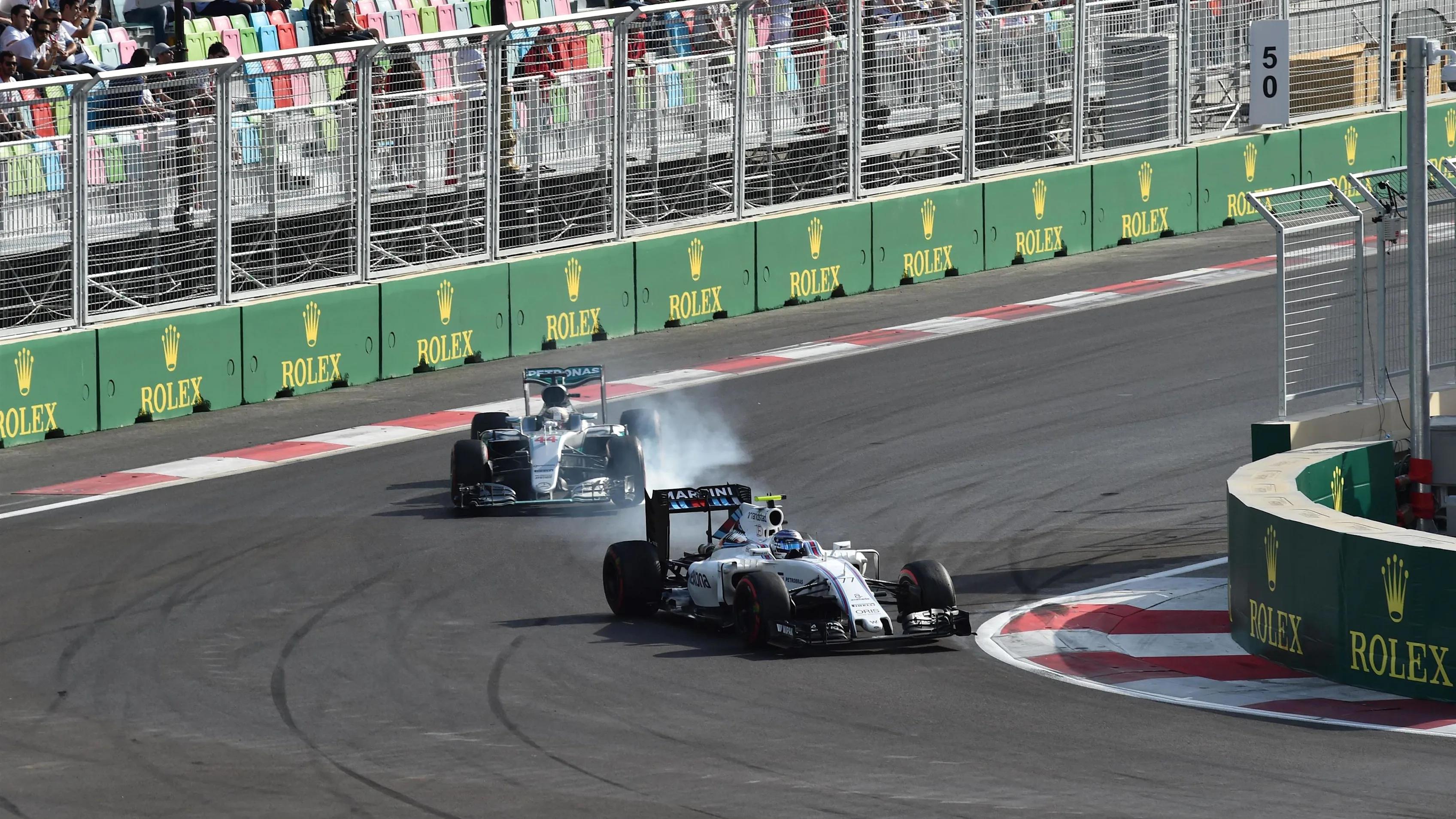 Valtteri Bottas (FIN) Williams FW38 locks up and Lewis Hamilton (GBR) Mercedes-Benz F1 W07 Hybrid at Formula One World Championship, Rd8, European Grand Prix, Race, Baku City Circuit, Baku, Azerbaijan, Sunday 19 June 2016. © Sutton Images
